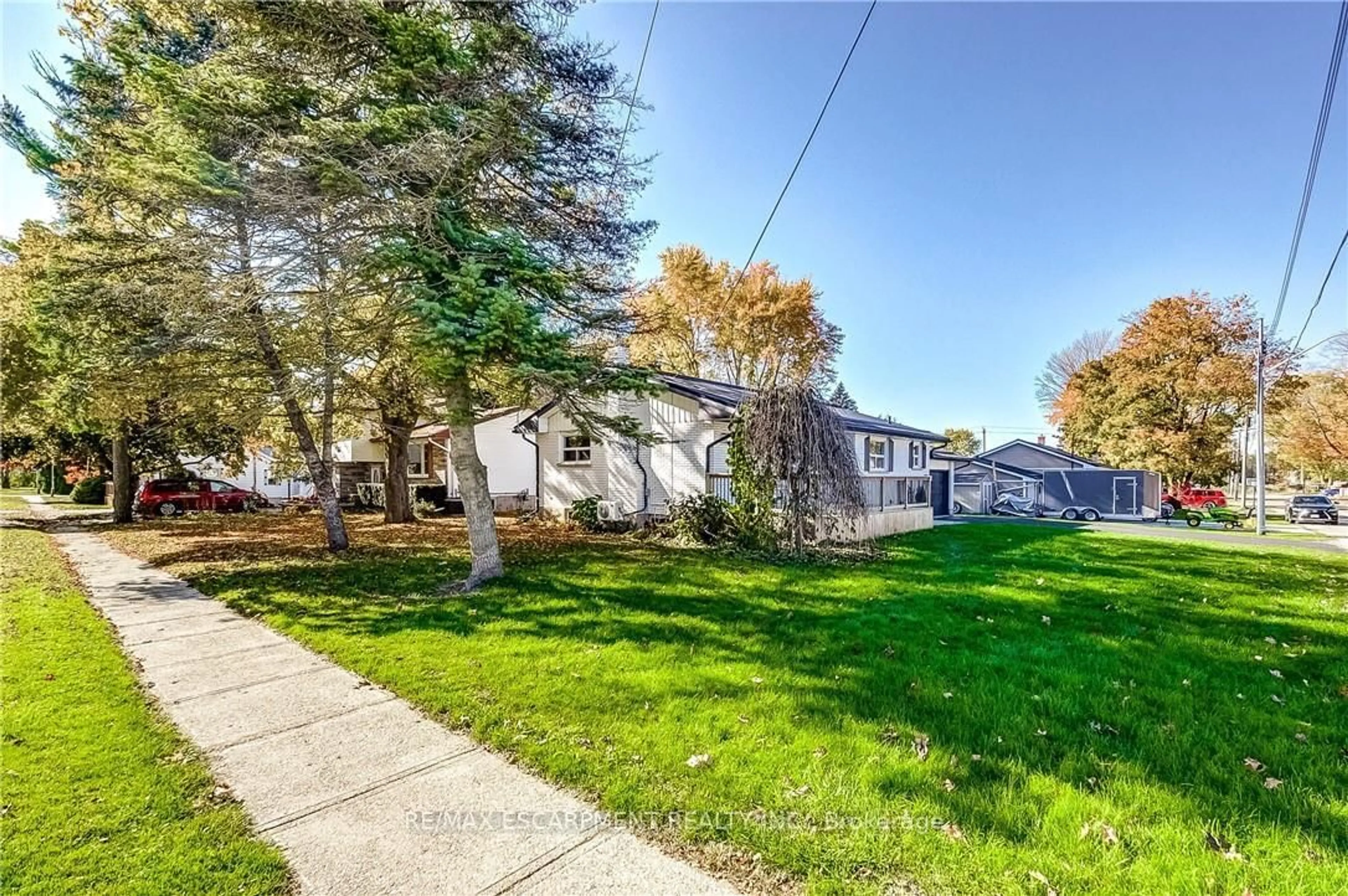 A pic from outside/outdoor area/front of a property/back of a property/a pic from drone, street for 480 Cavan St, Minto Ontario N0G 2P0