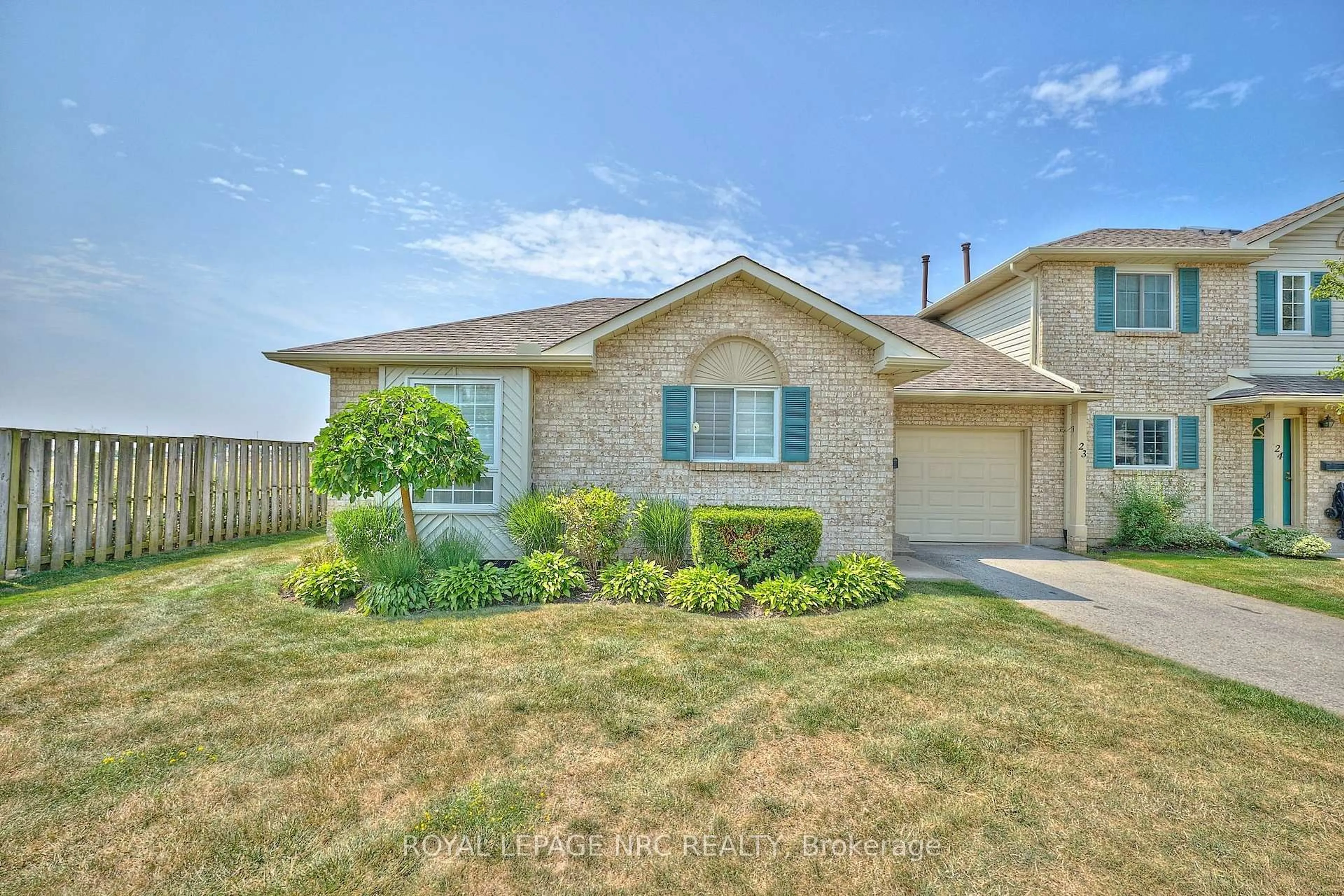 Home with brick exterior material, street for 7470 MONASTERY Dr #23, Niagara Falls Ontario L2H 3B3