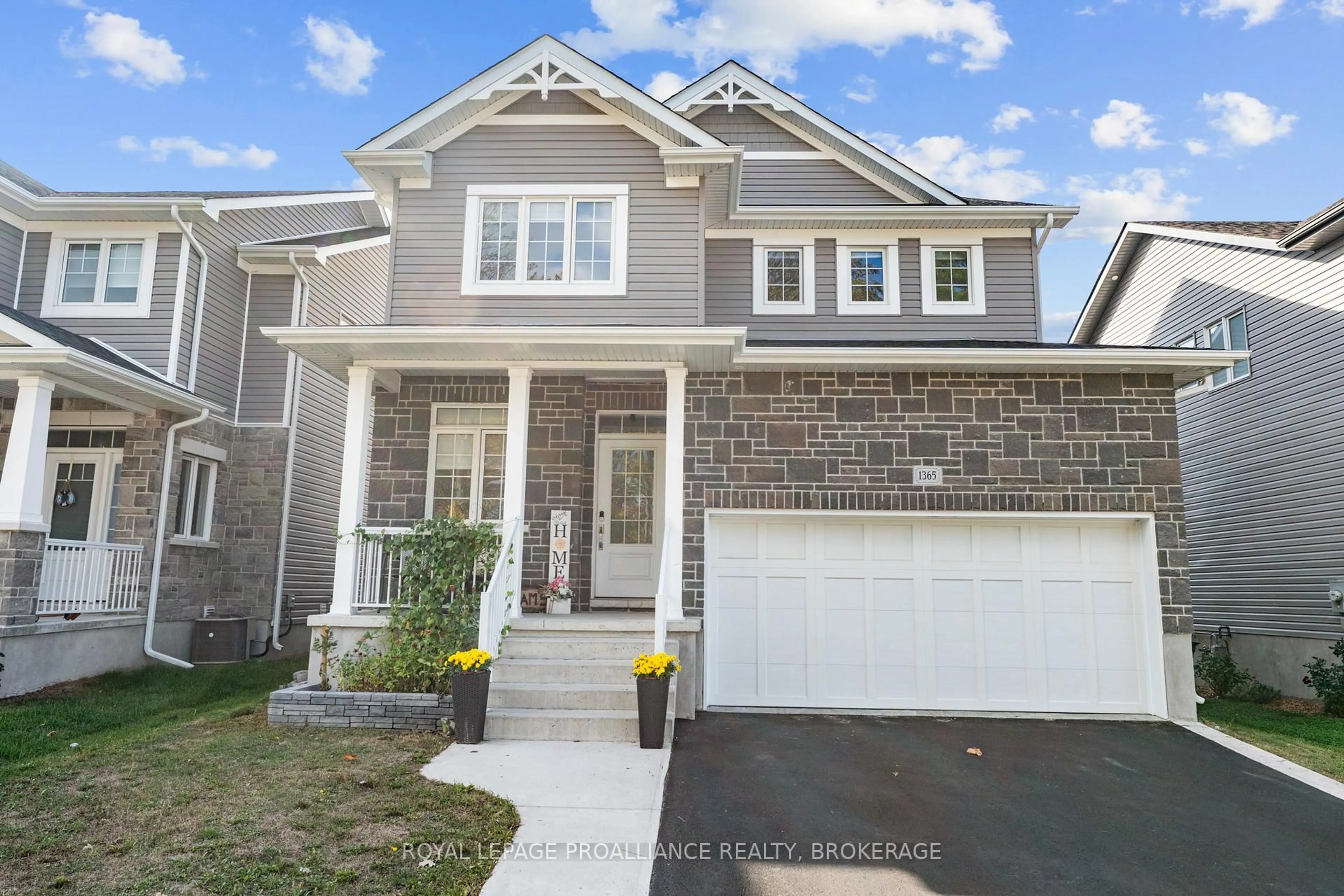 Home with vinyl exterior material, street for 1365 Andersen Dr, Kingston Ontario K7P 0P5