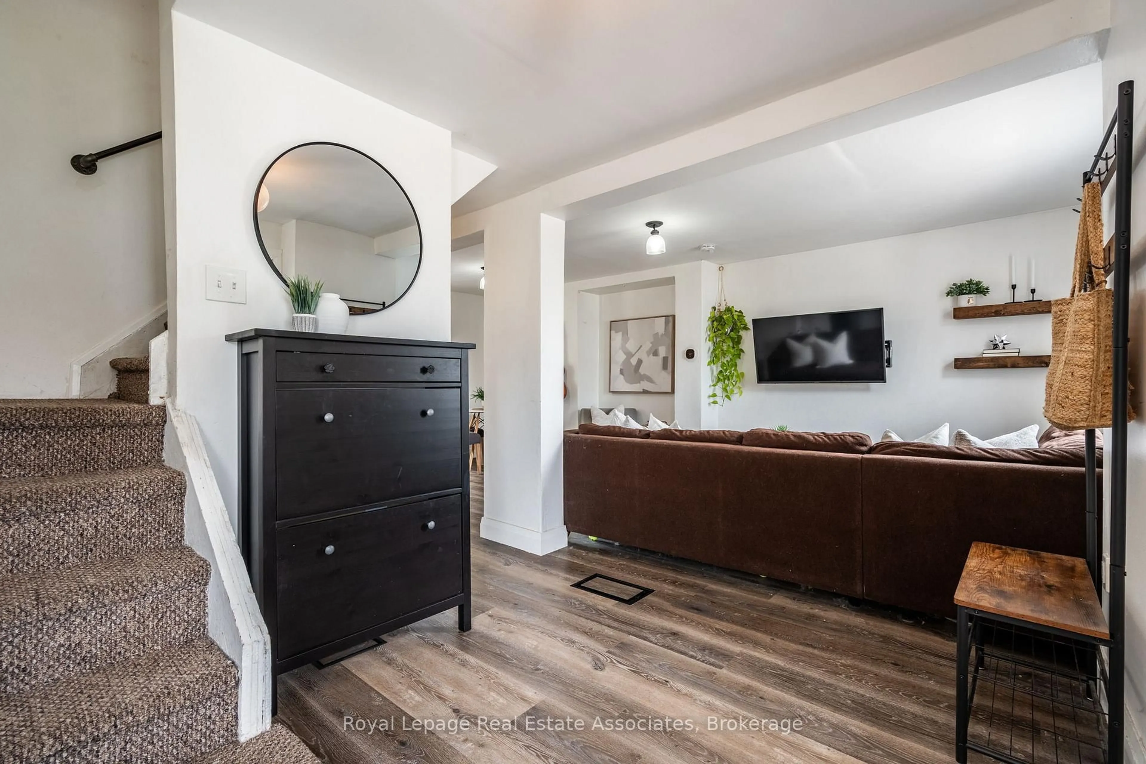 Living room with furniture, wood/laminate floor for 28 Edinburgh Ave, Hamilton Ontario L8H 2C3