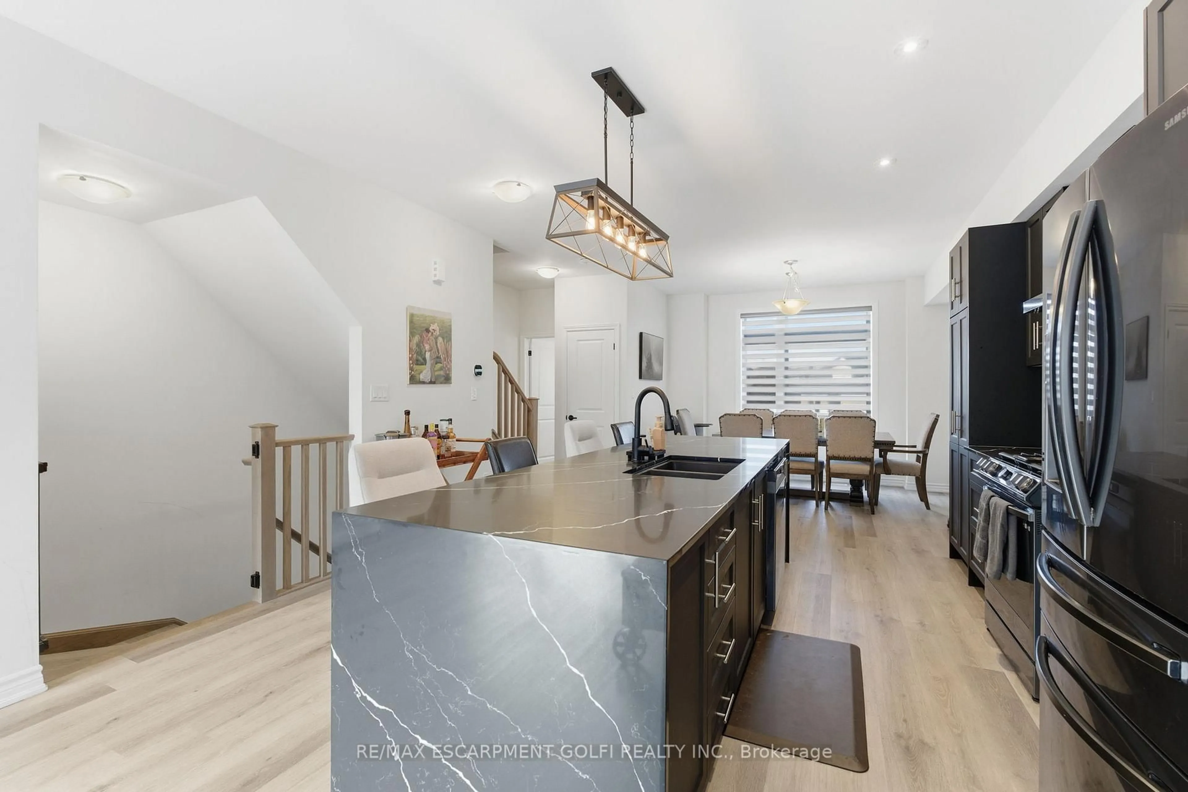 Open concept kitchen, unknown for 48 Capstone Lane, Hamilton Ontario L9C 0E8