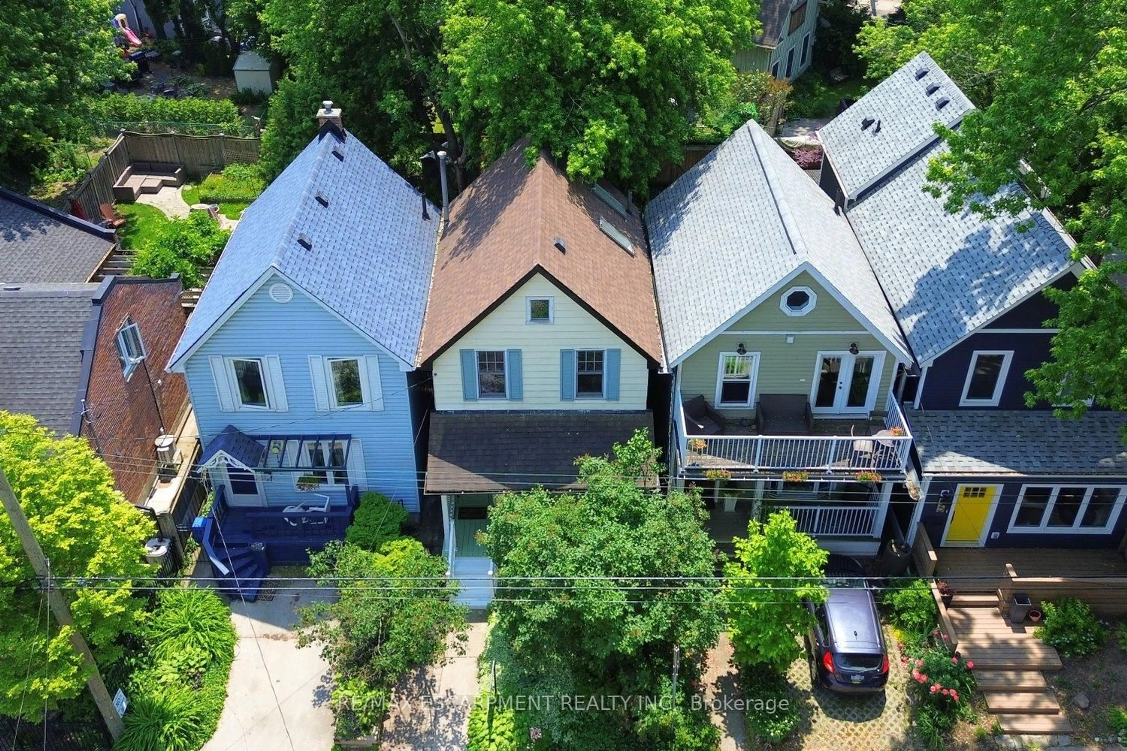 A pic from outside/outdoor area/front of a property/back of a property/a pic from drone, street for 61 Burlington St, Hamilton Ontario L8L 1G6