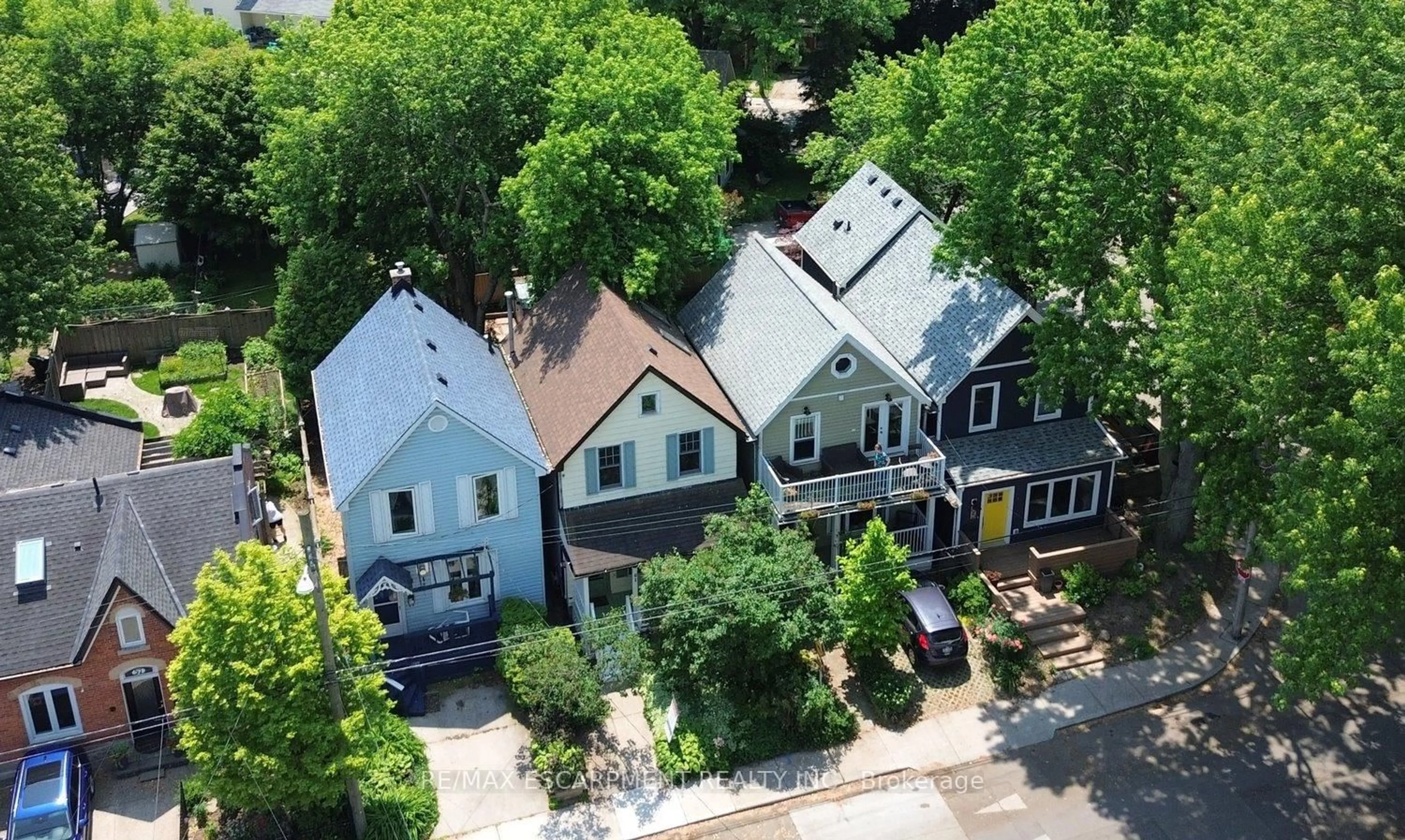 A pic from outside/outdoor area/front of a property/back of a property/a pic from drone, street for 61 Burlington St, Hamilton Ontario L8L 1G6