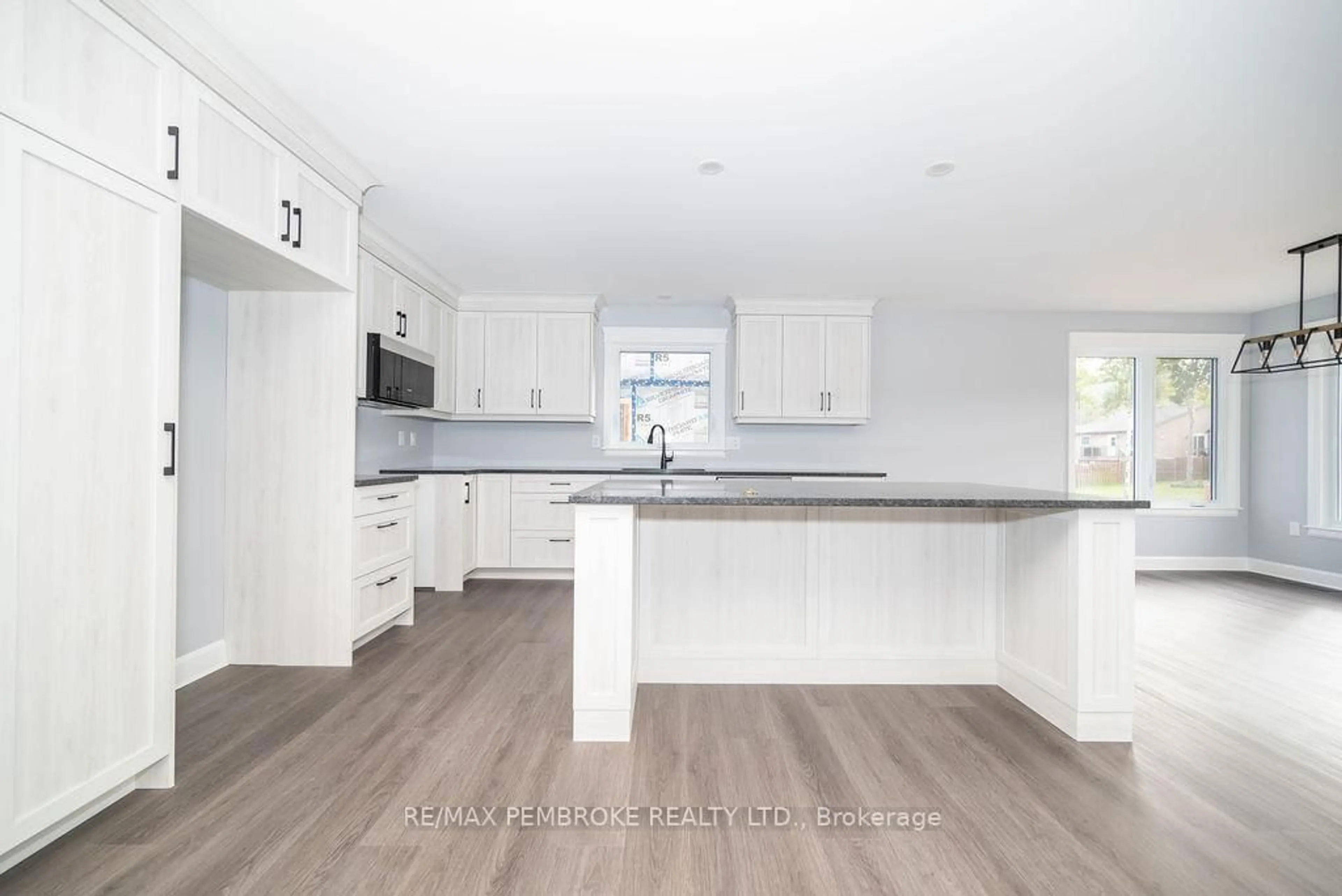 Open concept kitchen, wood/laminate floor for 22 DURANT St, Petawawa Ontario K8H 0G2