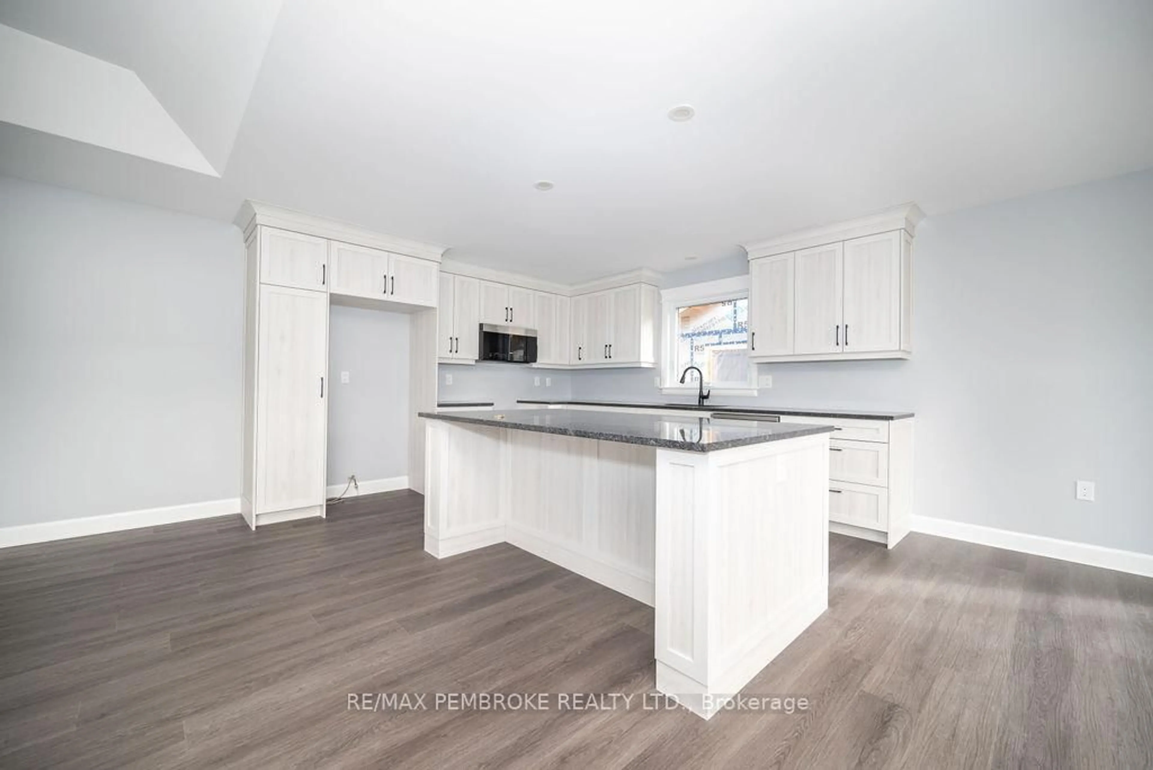 Open concept kitchen, wood/laminate floor for 22 DURANT St, Petawawa Ontario K8H 0G2