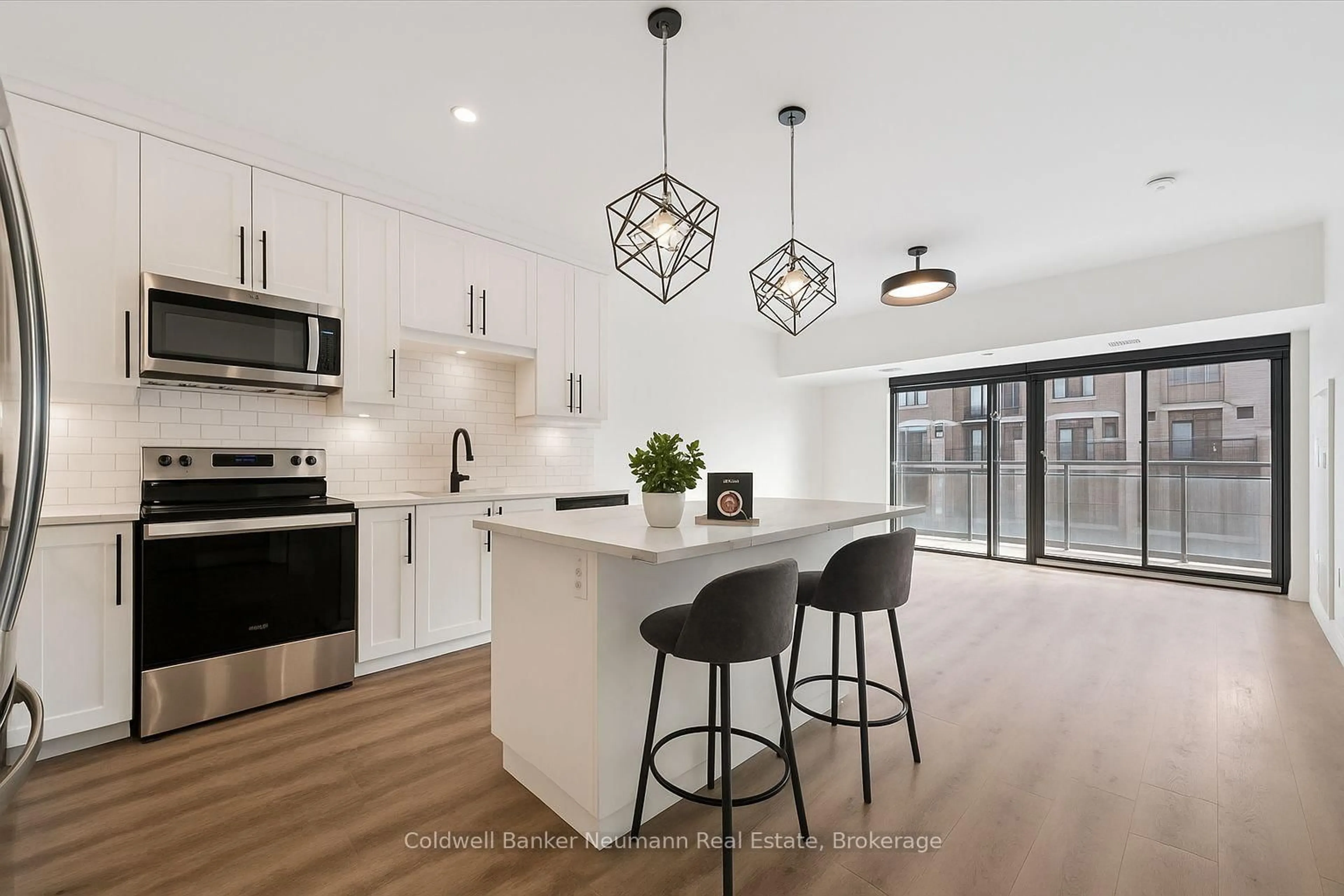 Open concept kitchen, ceramic/tile floor for 332 Gosling Gdns #213, Guelph Ontario N1L 0P8