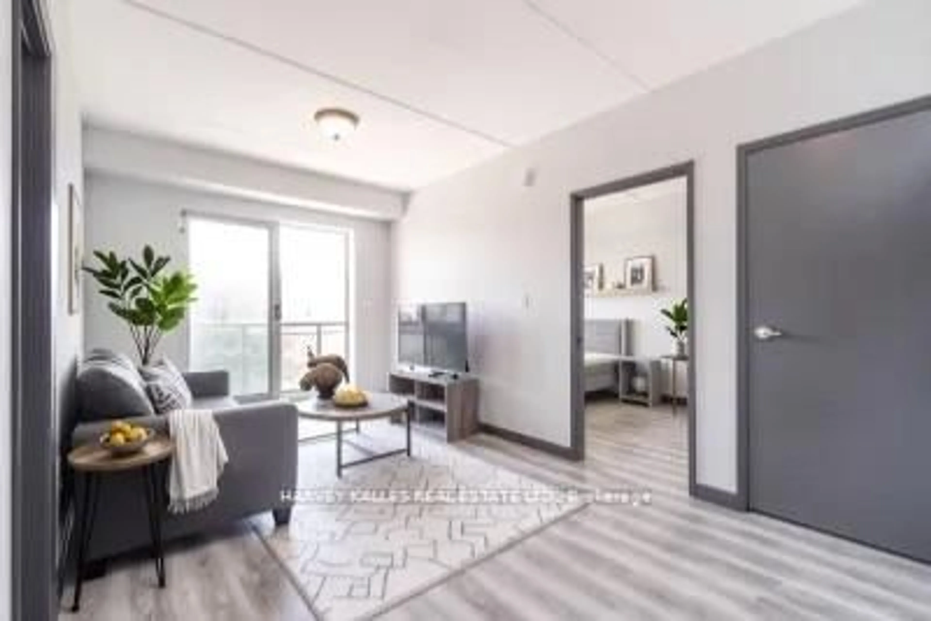 Living room with furniture, unknown for 275 Larch St #A502, Waterloo Ontario N2L 3R2