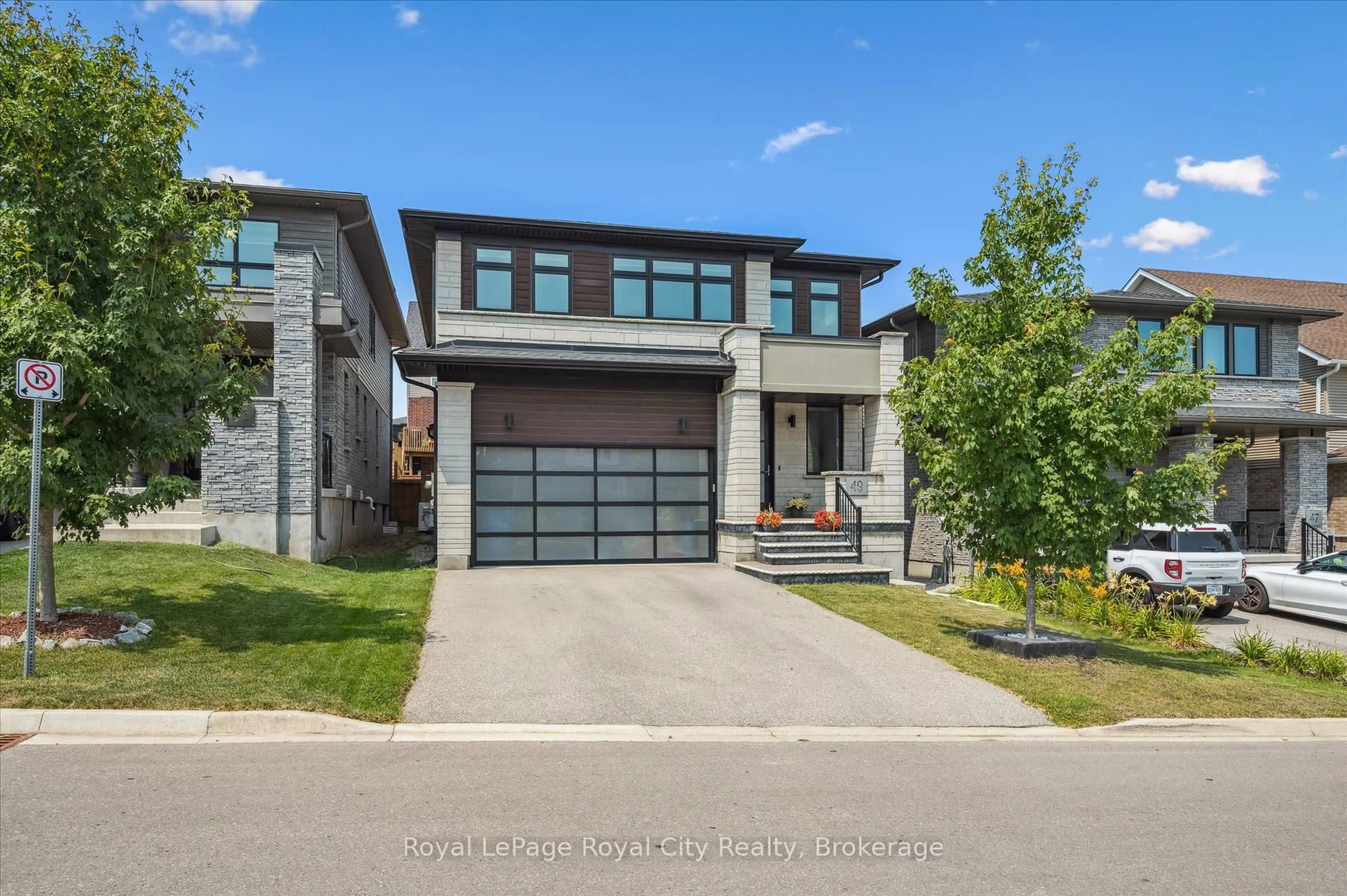 Home with brick exterior material, street for 49 Ryder Ave, Guelph Ontario N1G 0H1