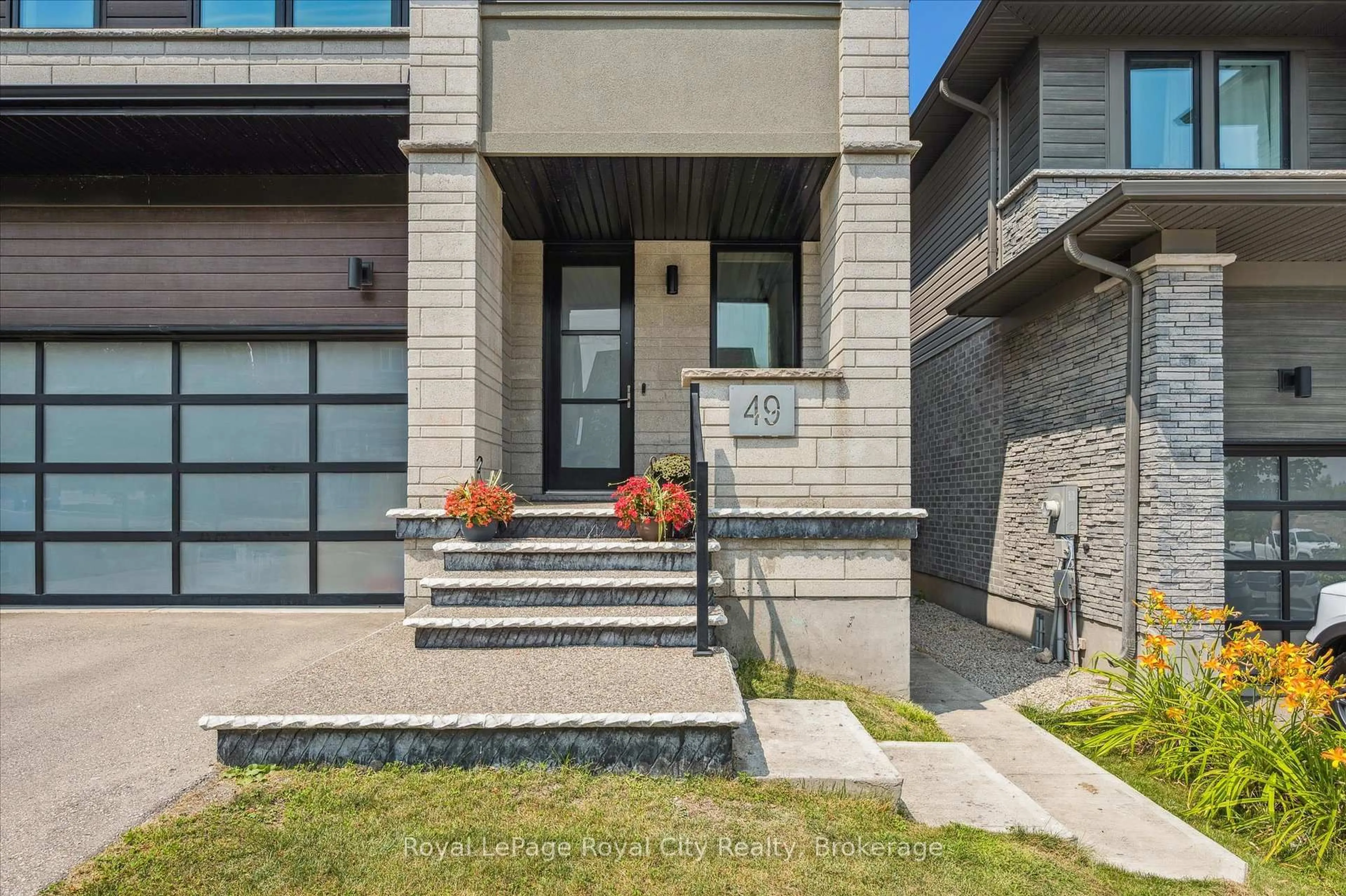 Home with brick exterior material, street for 49 Ryder Ave, Guelph Ontario N1G 0H1