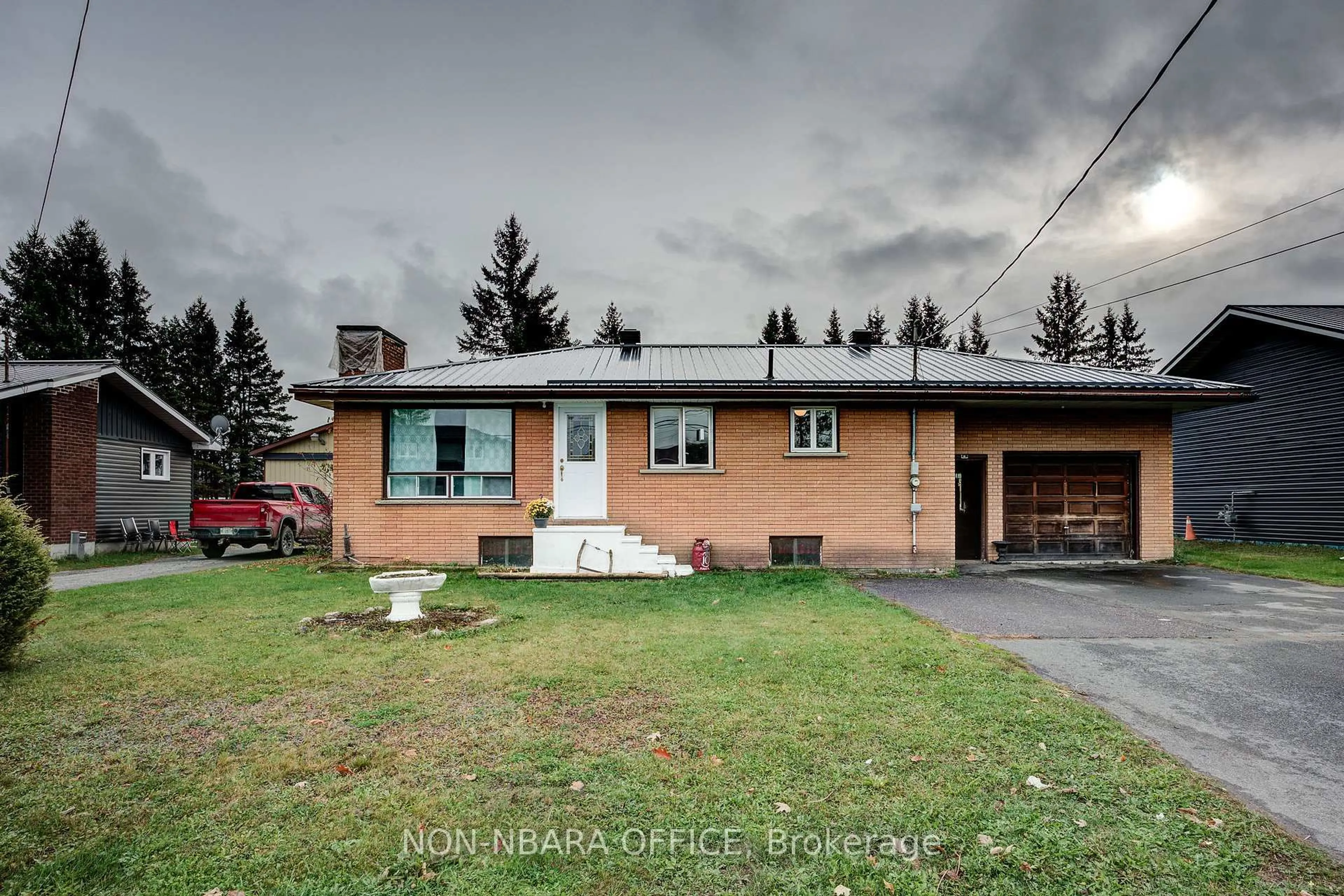 A pic from outside/outdoor area/front of a property/back of a property/a pic from drone, street for 10 Rutland Ave, West Nipissing Ontario P0H 2N0