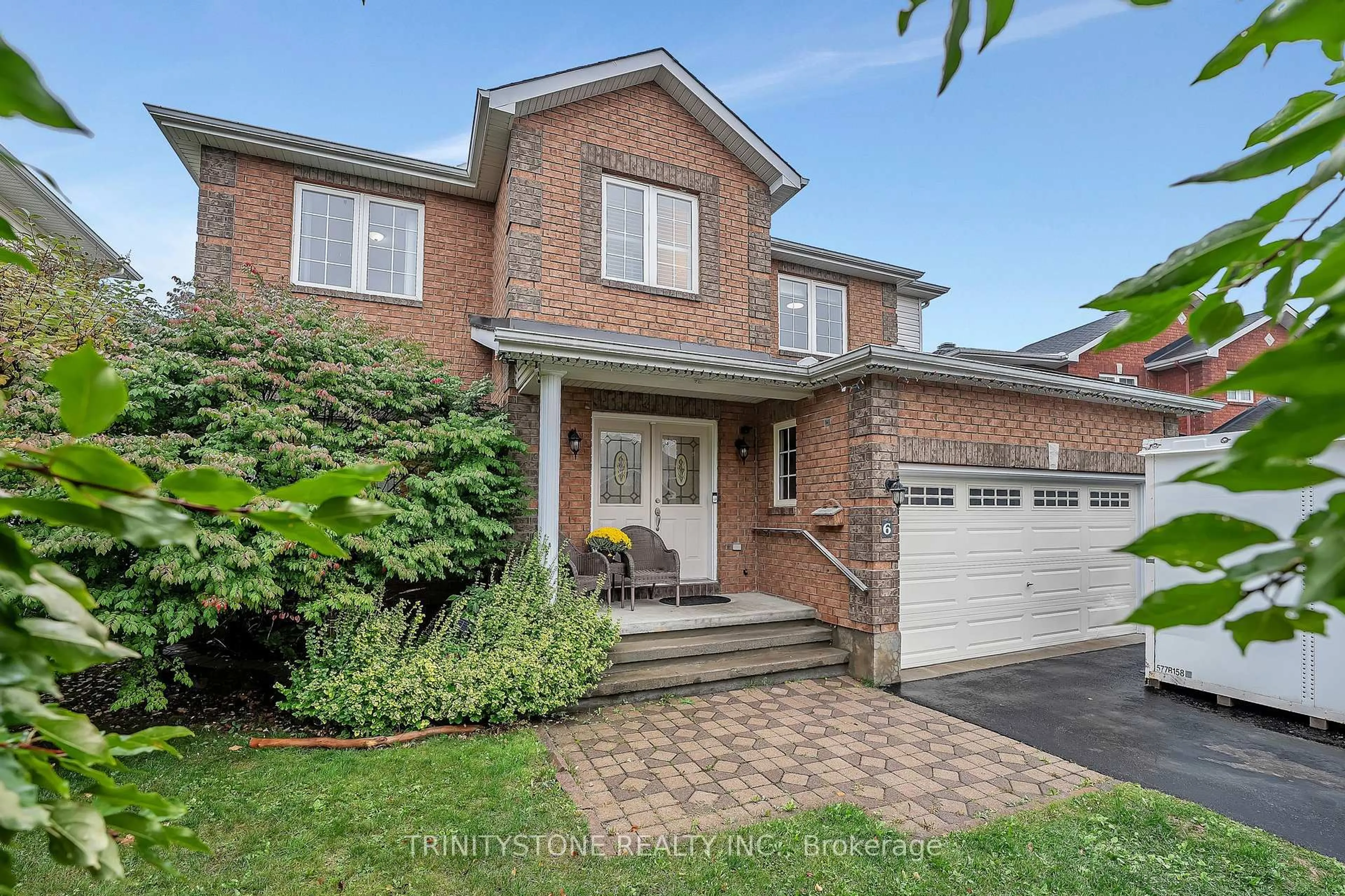 Home with brick exterior material, street for 6 Cinnabar Way, Stittsville Ontario K2S 1Y4