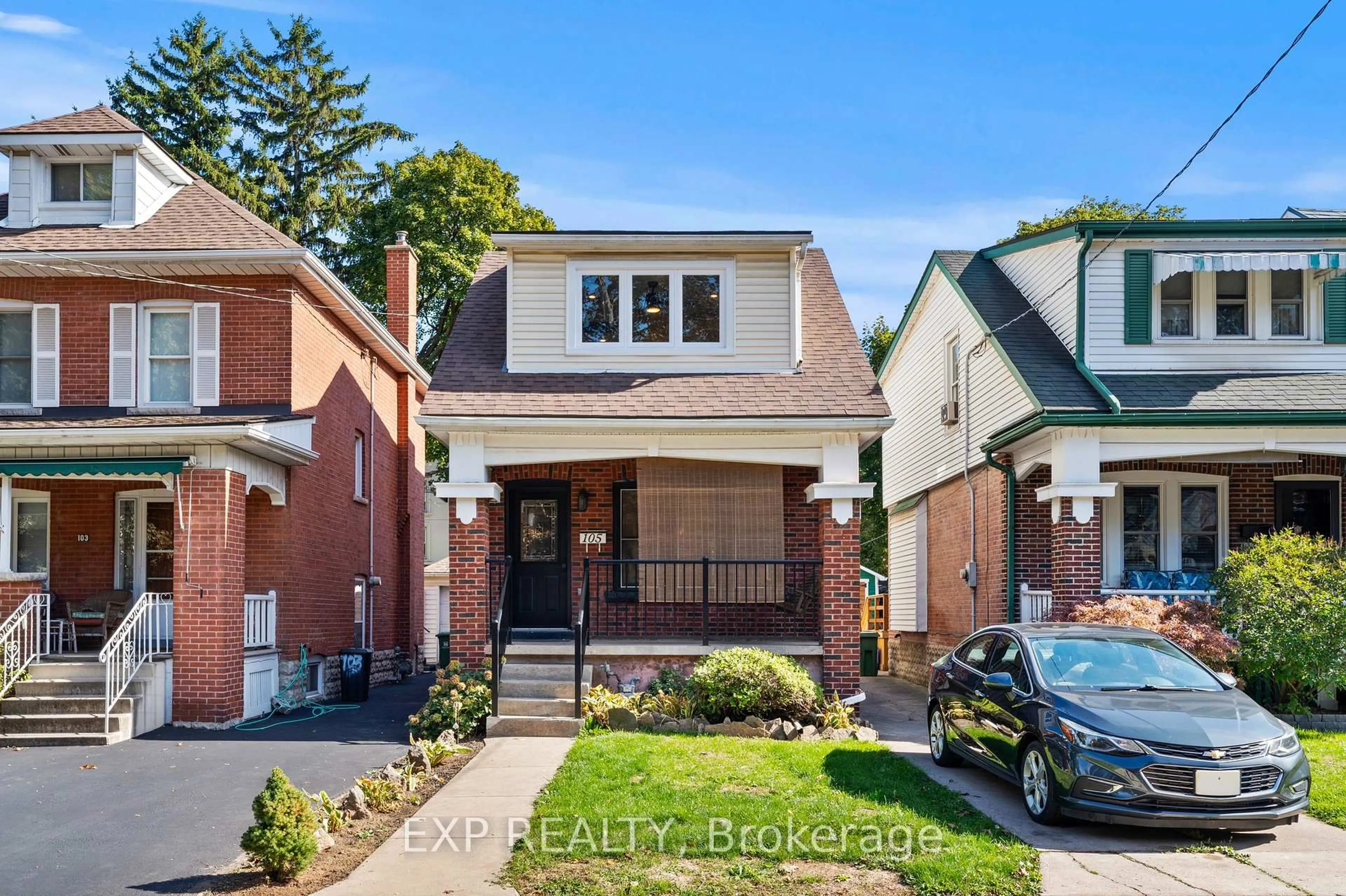 Home with brick exterior material, street for 105 Rothsay Ave, Hamilton Ontario L8M 3G3