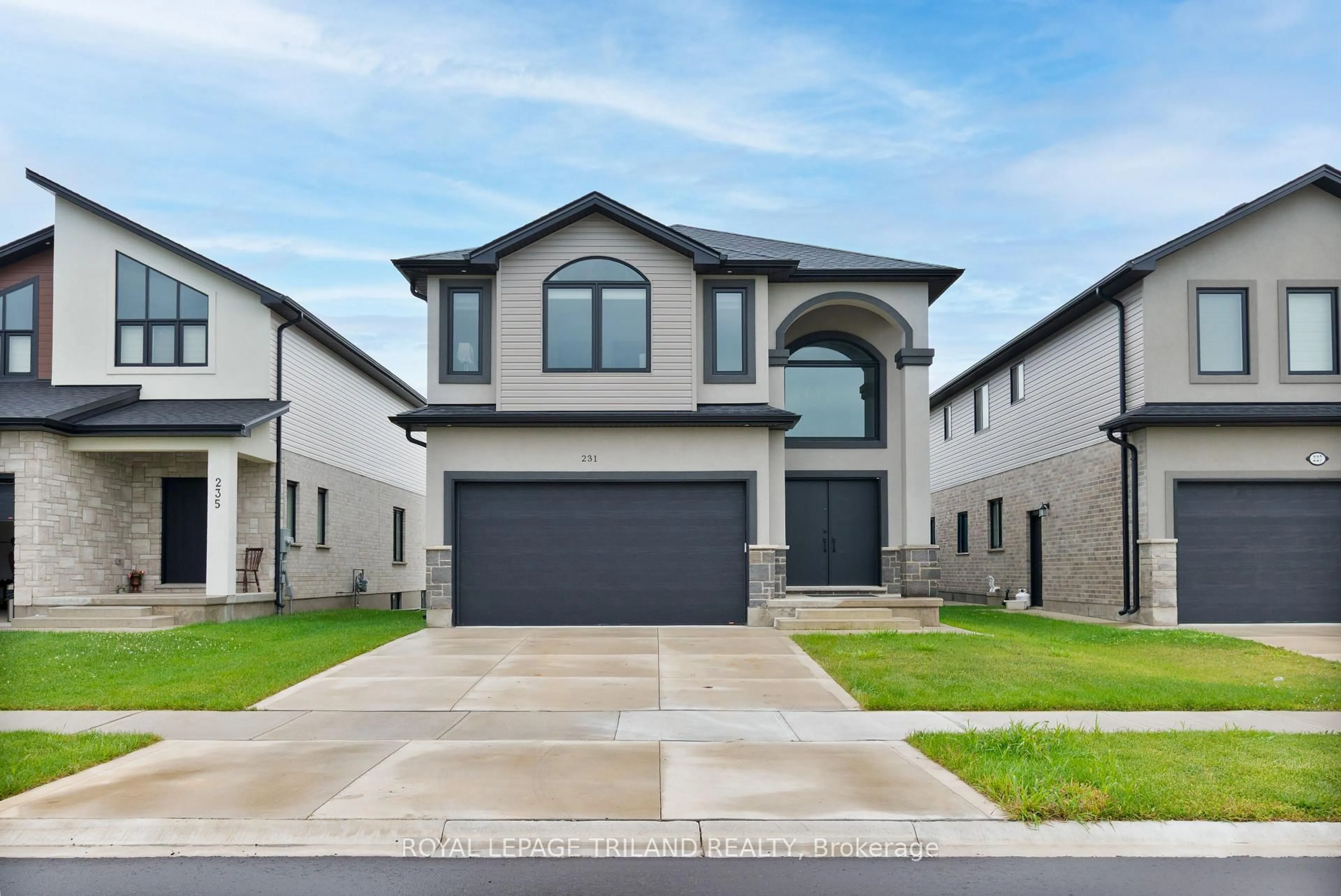 Home with vinyl exterior material, street for 231 Roy McDonald Dr, London South Ontario N6L 0J1