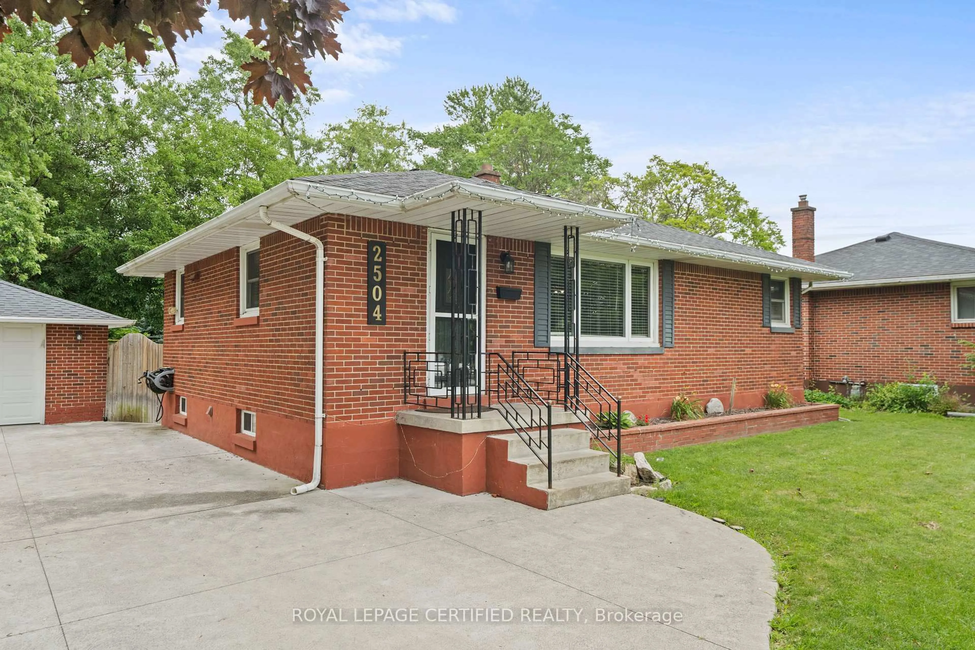 Home with brick exterior material, street for 2504 Askin Ave, Windsor Ontario N9E 3H7