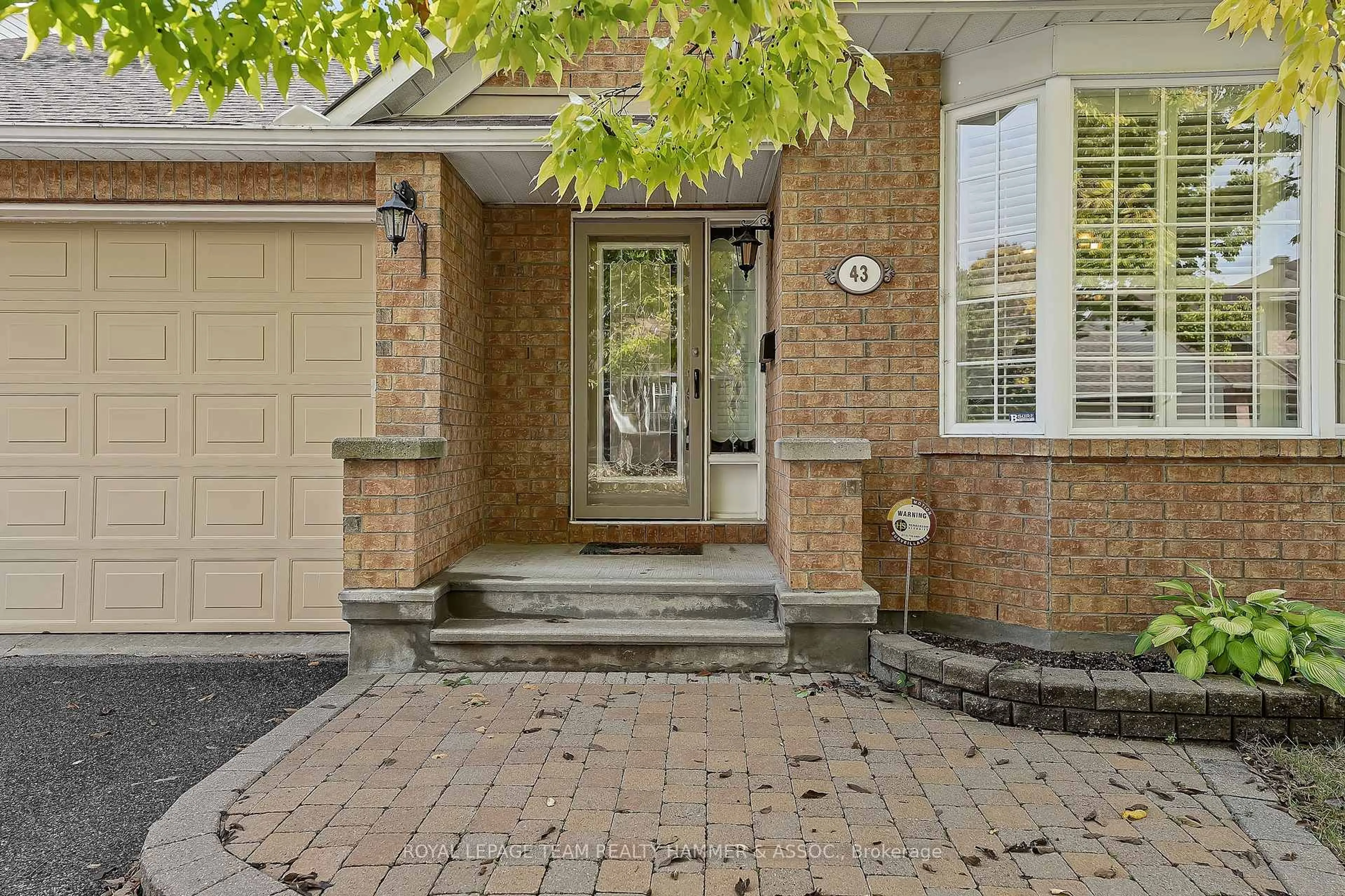 Home with brick exterior material, street for 43 Settler's Ridge Way, Ottawa Ontario K2J 4V2