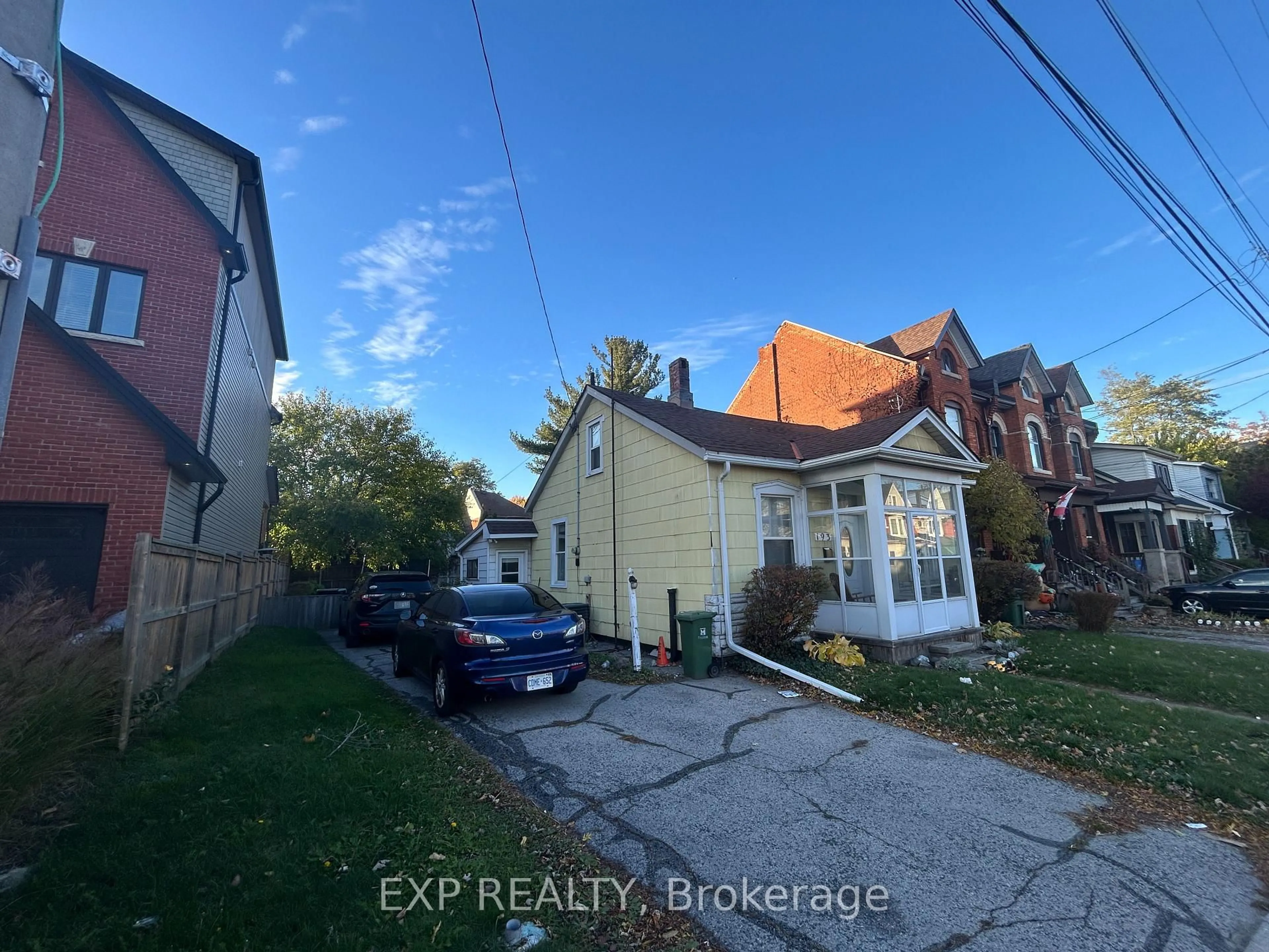 A pic from outside/outdoor area/front of a property/back of a property/a pic from drone, street for 193 Locke St, Hamilton Ontario L8R 3B1