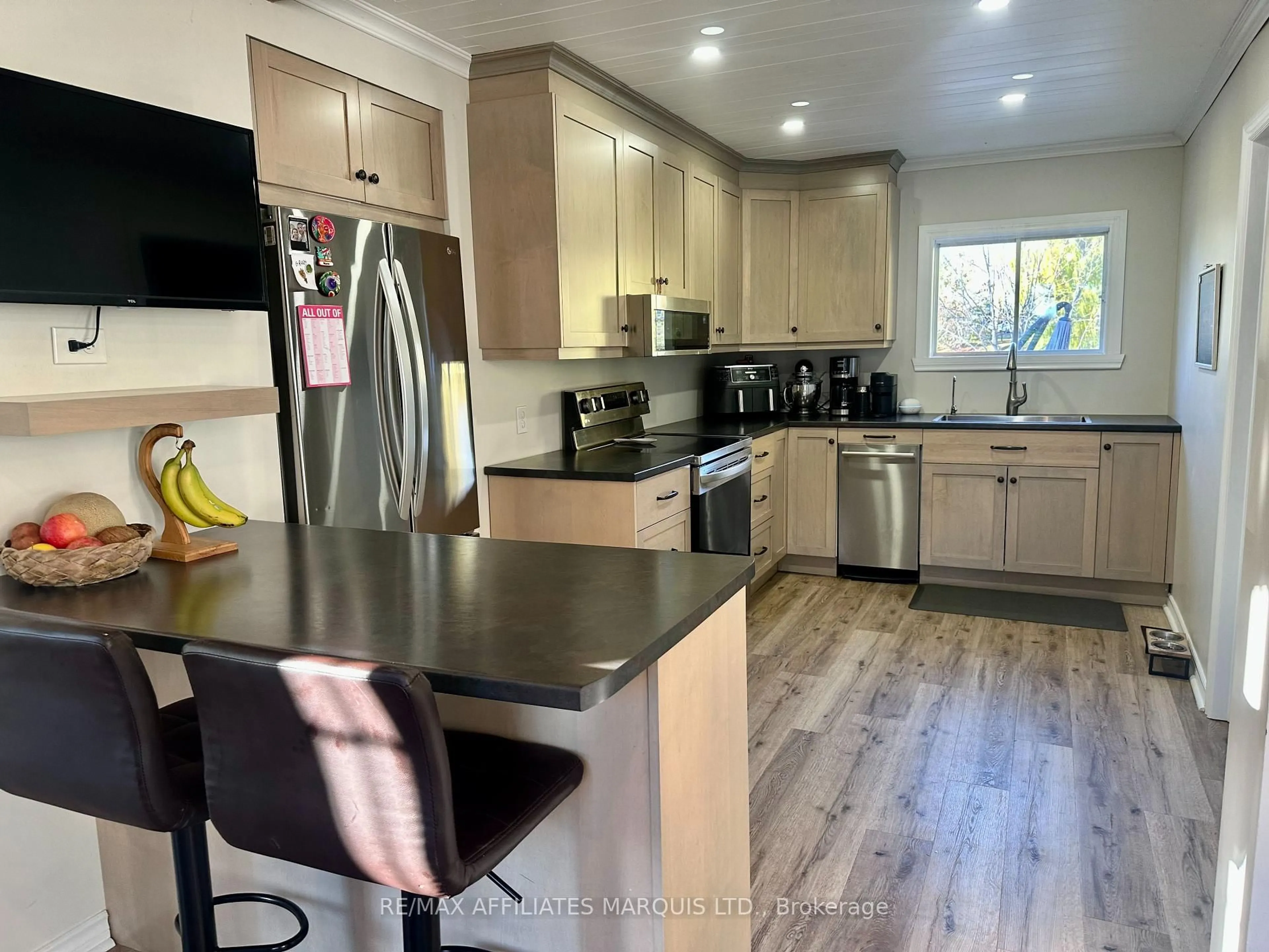 Open concept kitchen, wood/laminate floor for 19663 William St, South Glengarry Ontario K0C 2J0