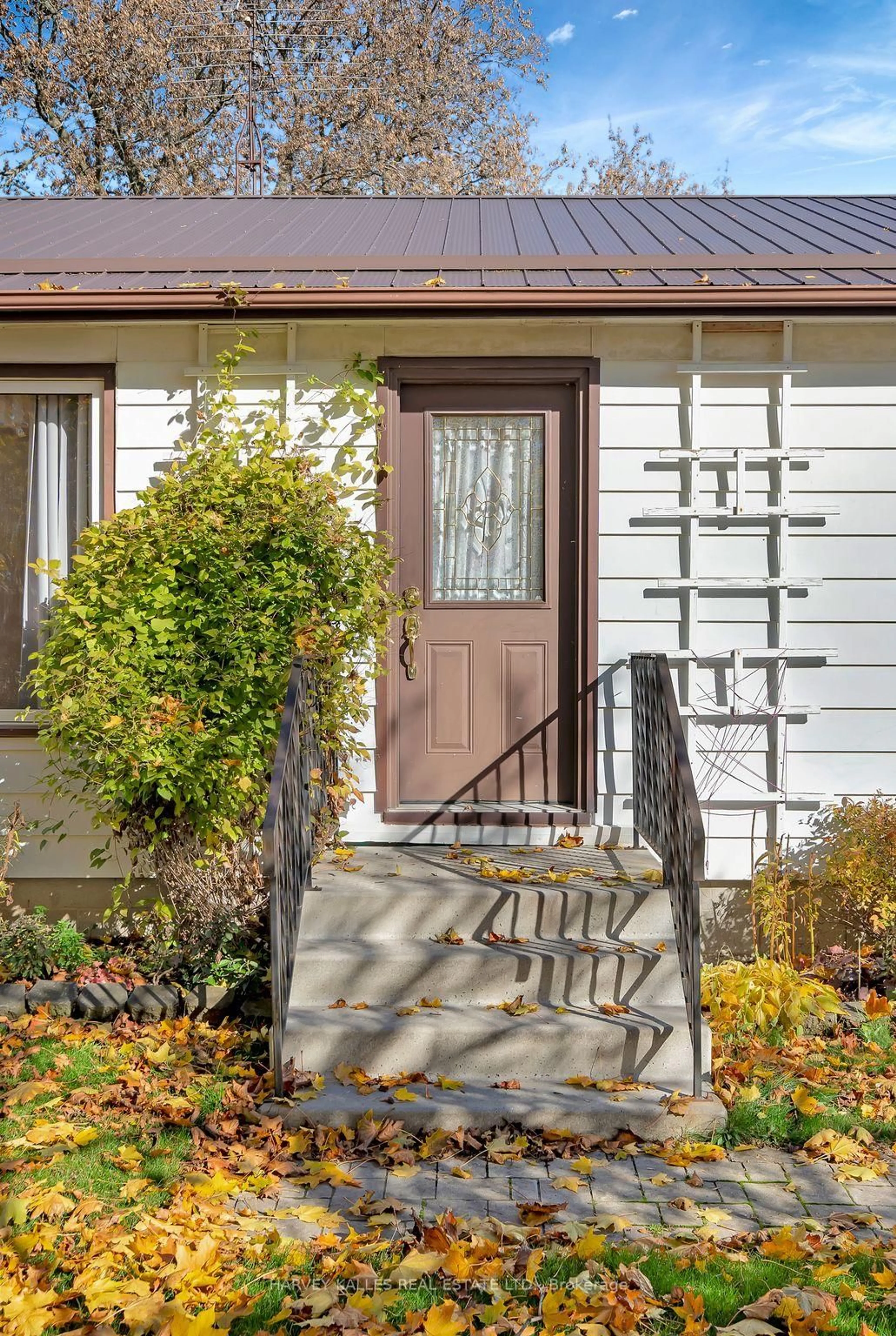 Home with vinyl exterior material, street for 1075 County Rd 10 Rd, Prince Edward County Ontario K0K 2T0