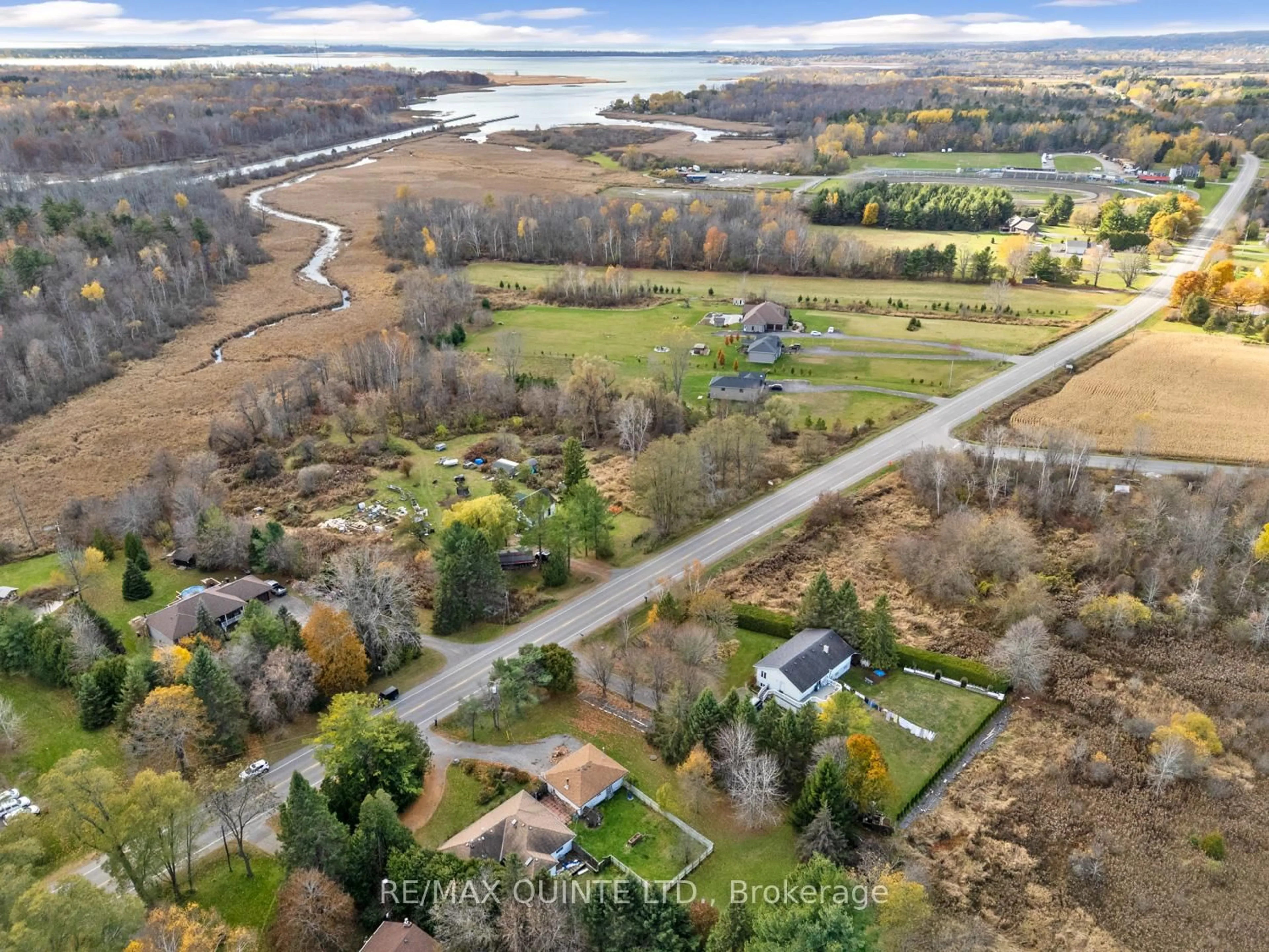 A pic from outside/outdoor area/front of a property/back of a property/a pic from drone, water/lake/river/ocean view for 1046 County Rd 64, Brighton Ontario K0K 1H0