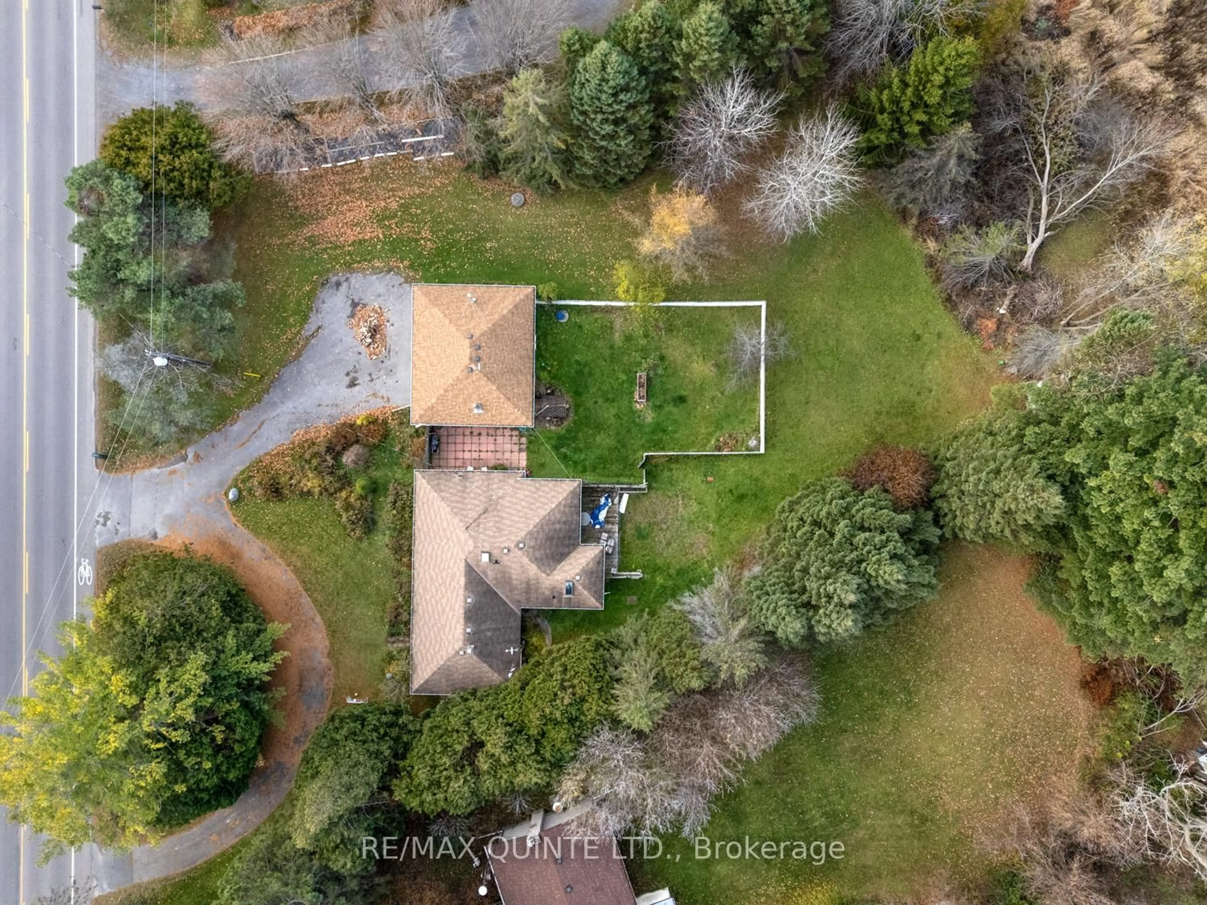 A pic from outside/outdoor area/front of a property/back of a property/a pic from drone, forest/trees view for 1046 County Rd 64, Brighton Ontario K0K 1H0