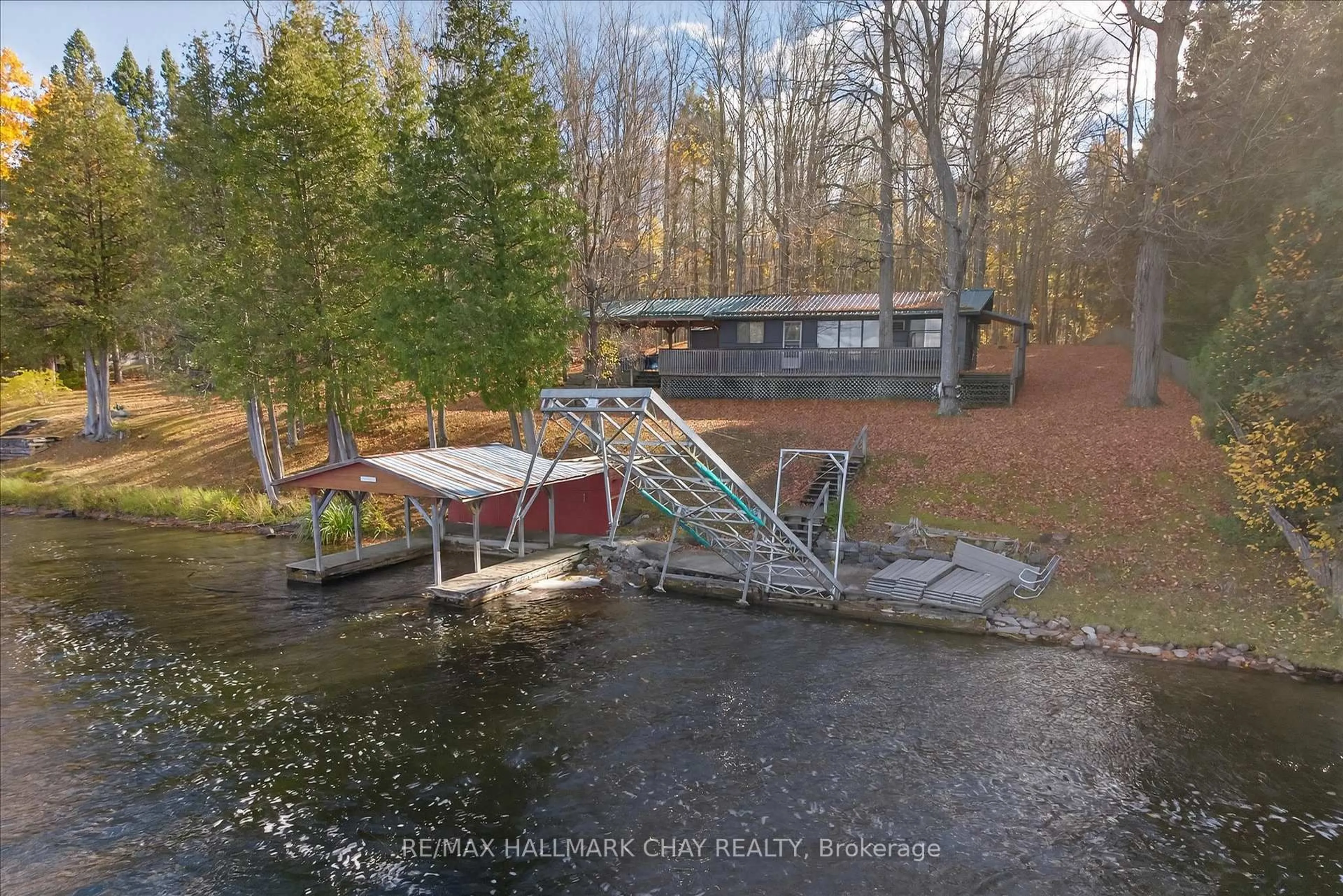 A pic from outside/outdoor area/front of a property/back of a property/a pic from drone, water/lake/river/ocean view for 1452-1460 Birchview Rd, Douro-Dummer Ontario K0L 2H0