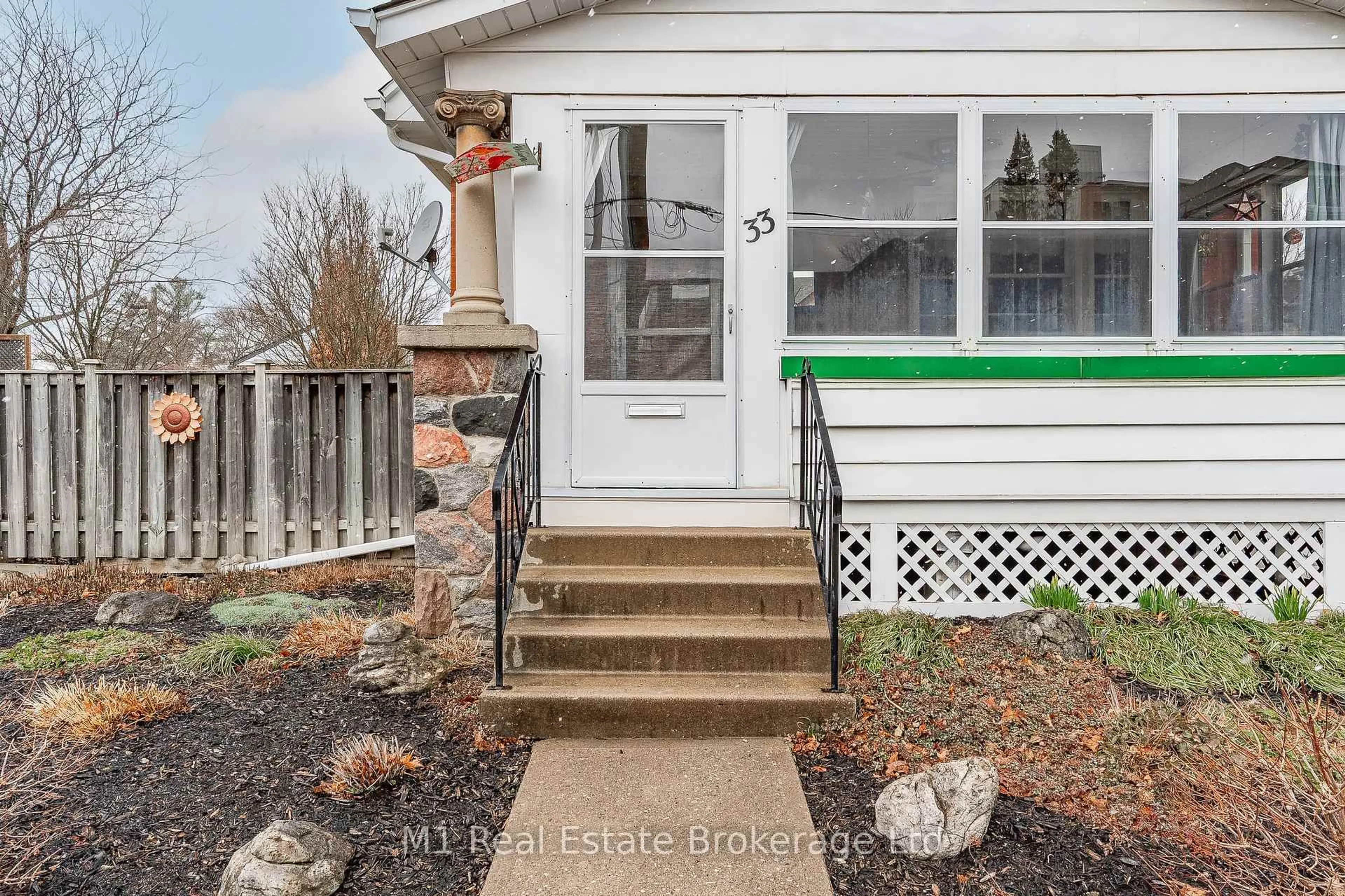 Home with vinyl exterior material, street for 33 Verney St, Guelph Ontario N1H 1N5