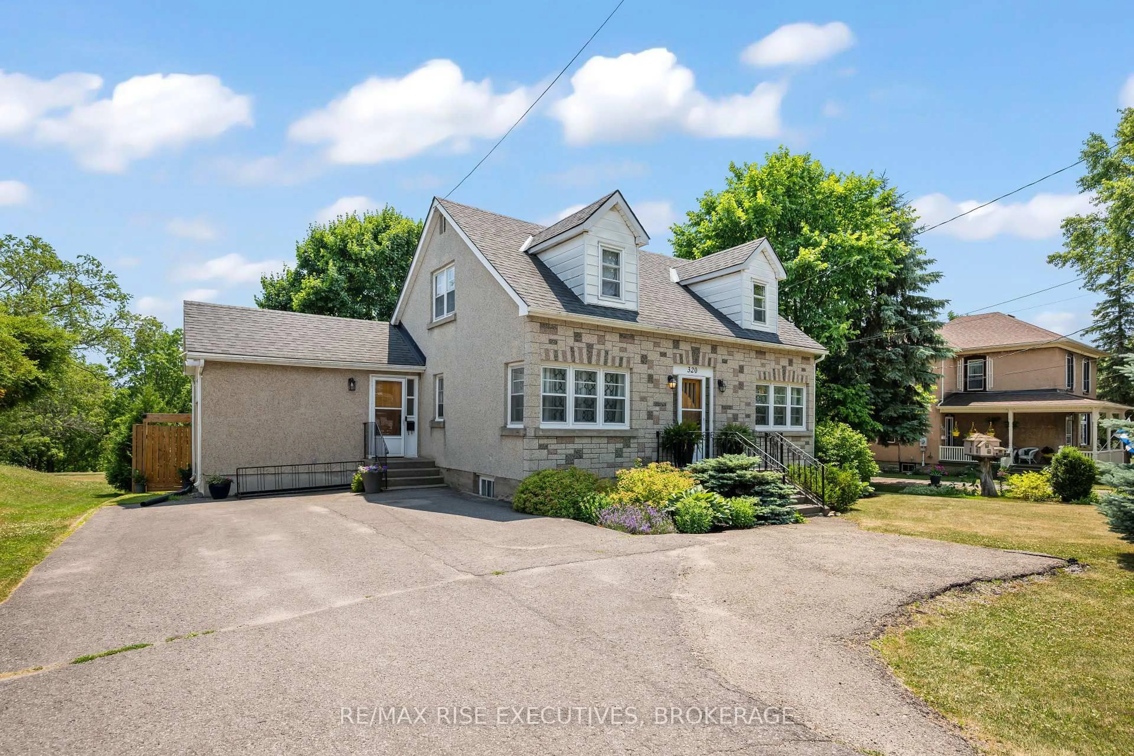A pic from outside/outdoor area/front of a property/back of a property/a pic from drone, street for 320 Dundas St, Greater Napanee Ontario K7R 2B4