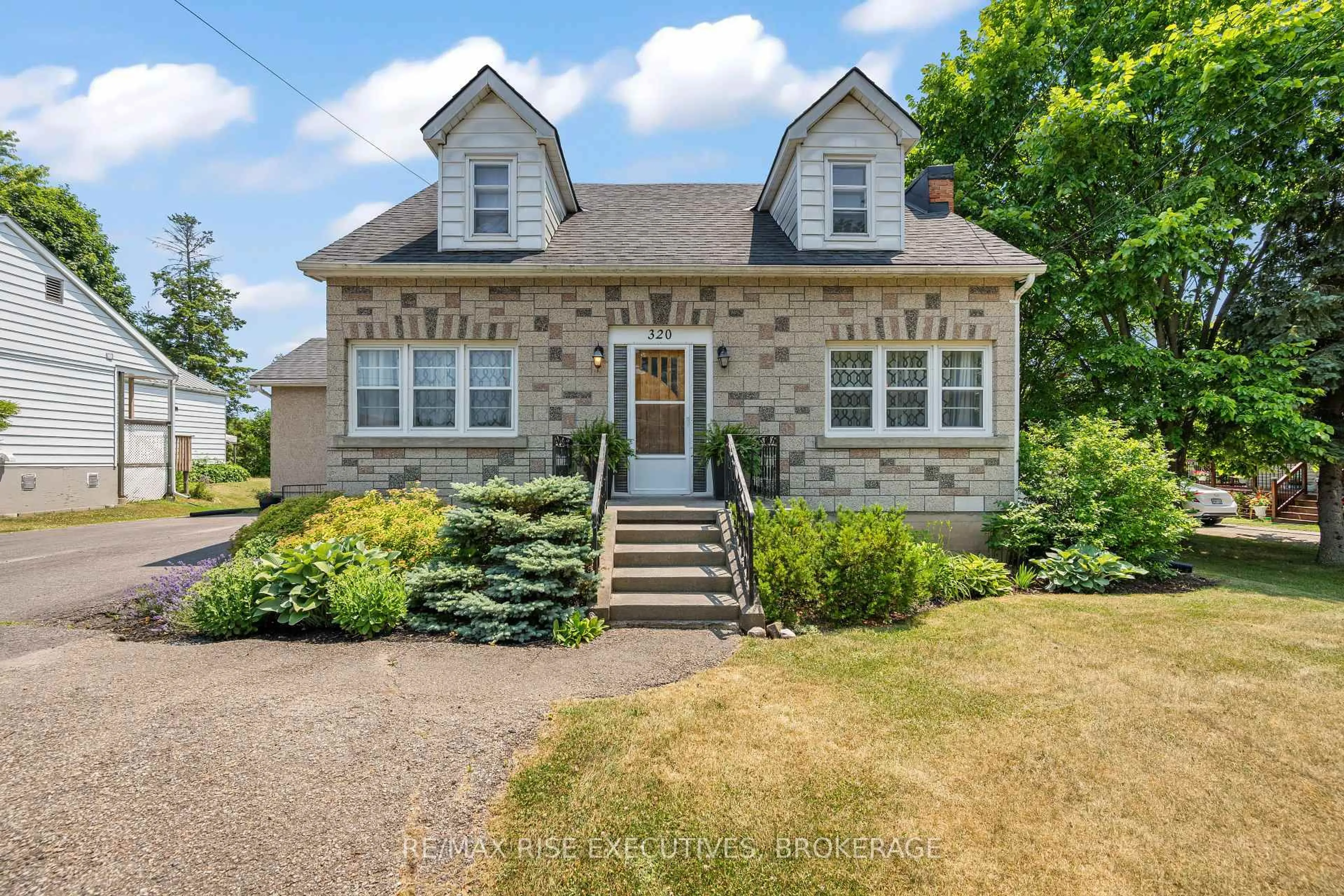 Home with brick exterior material, street for 320 Dundas St, Greater Napanee Ontario K7R 2B4