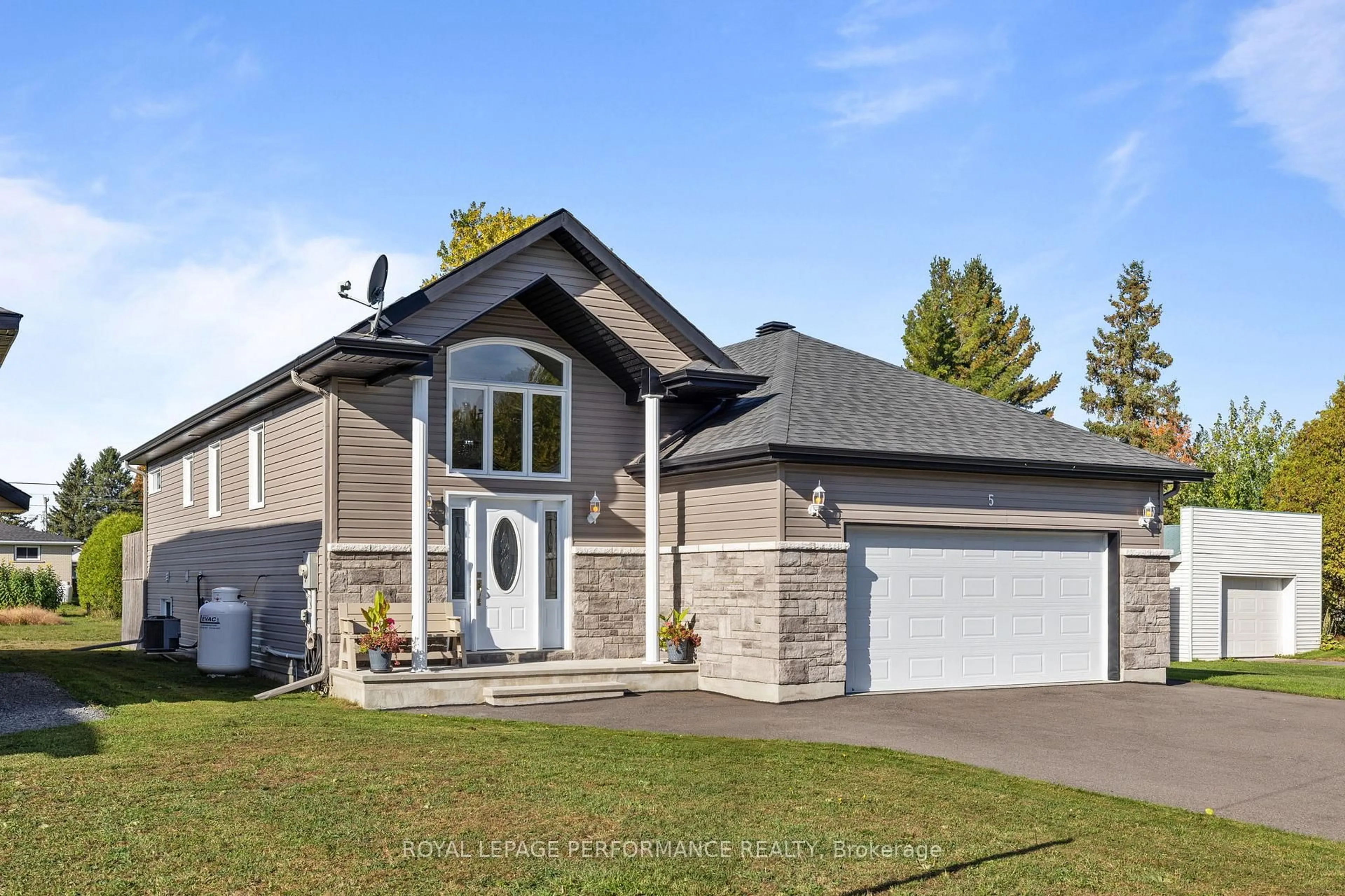 Home with vinyl exterior material, street for 5 Lamoureux St, The Nation Ontario K0G 1L0