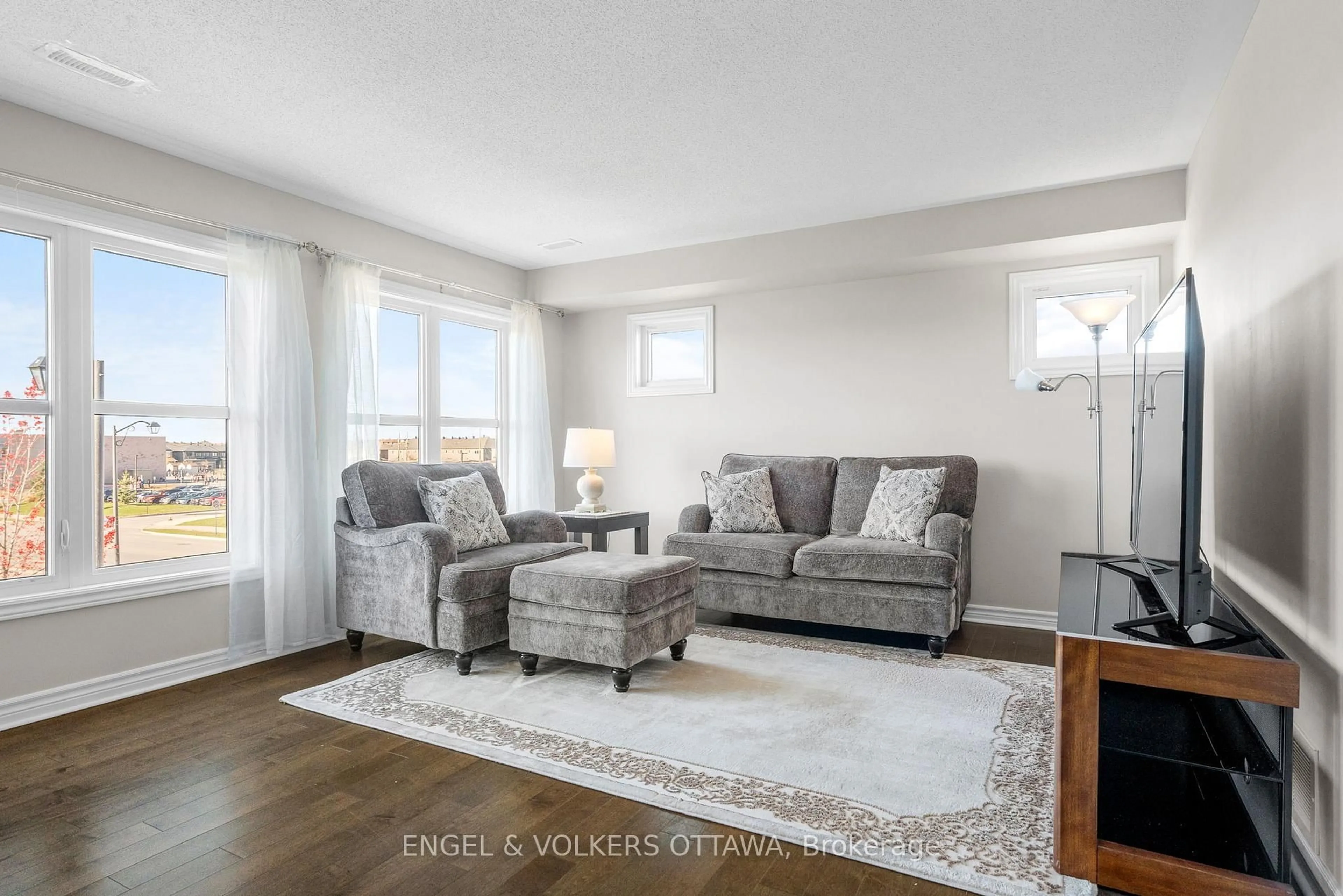 Living room with furniture, unknown for 743 Magnolia St #B, Ottawa Ontario K4A 1B7