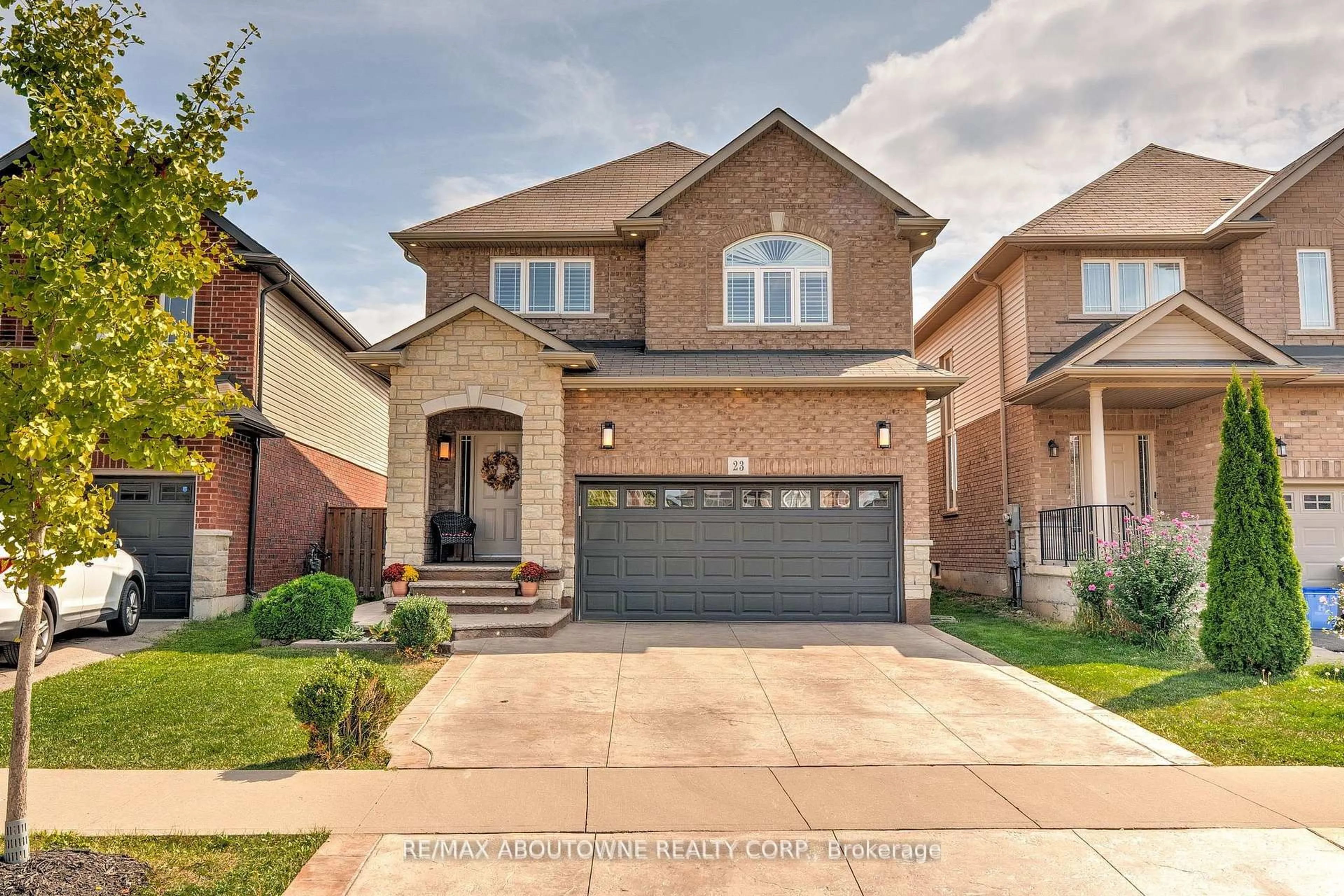 Home with brick exterior material, street for 23 Colorado Blvd, Hamilton Ontario L0R 1P0