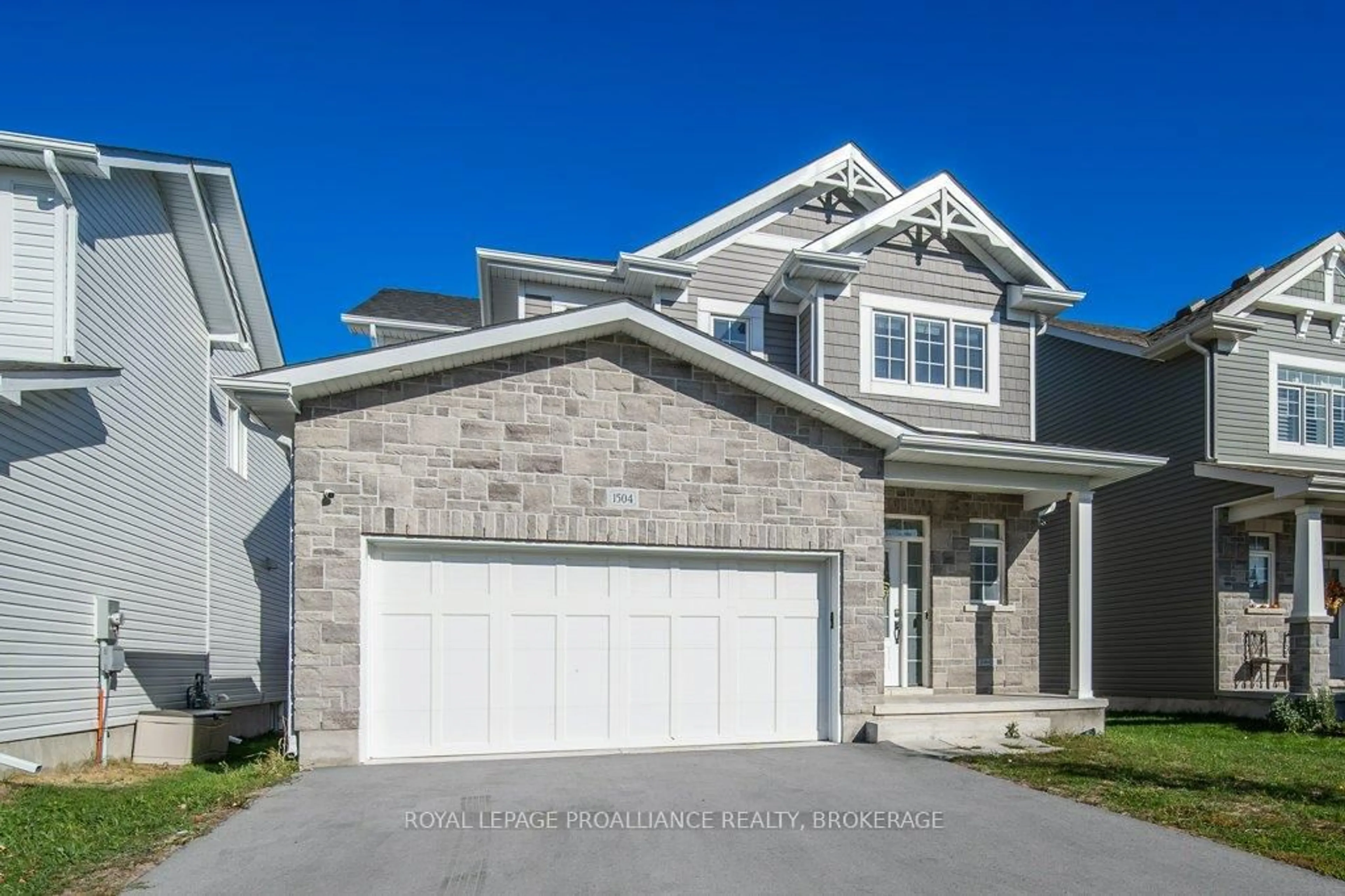 Home with vinyl exterior material, street for 1504 Shira Dr, Kingston Ontario K7P 0S3