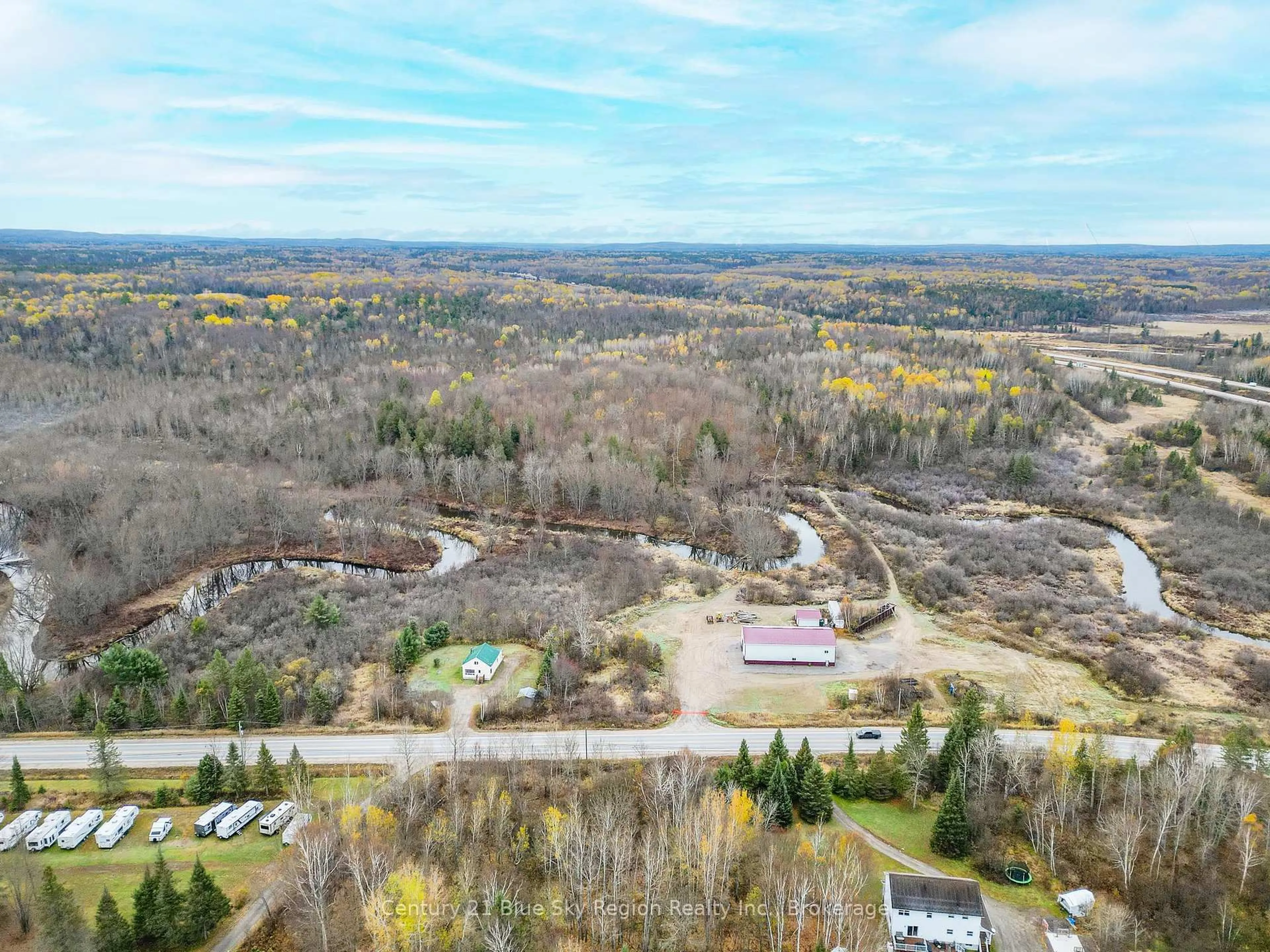 A pic from outside/outdoor area/front of a property/back of a property/a pic from drone, forest/trees view for 167-179 Lake Nosbonsing Rd, Callander Ontario P0H 1H0