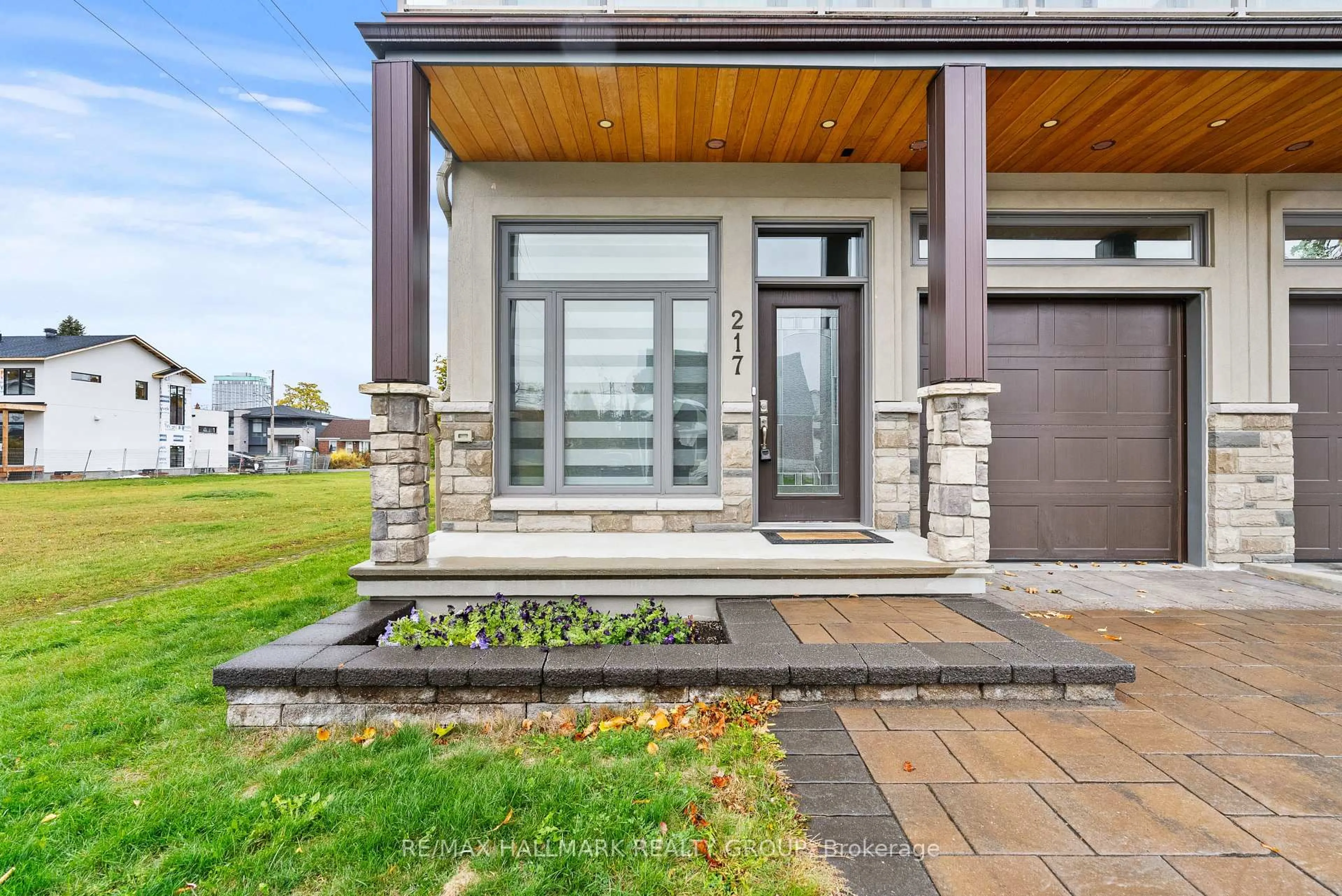 Home with brick exterior material, street for 217 Belford Cres, Ottawa Ontario K1Z 7A9