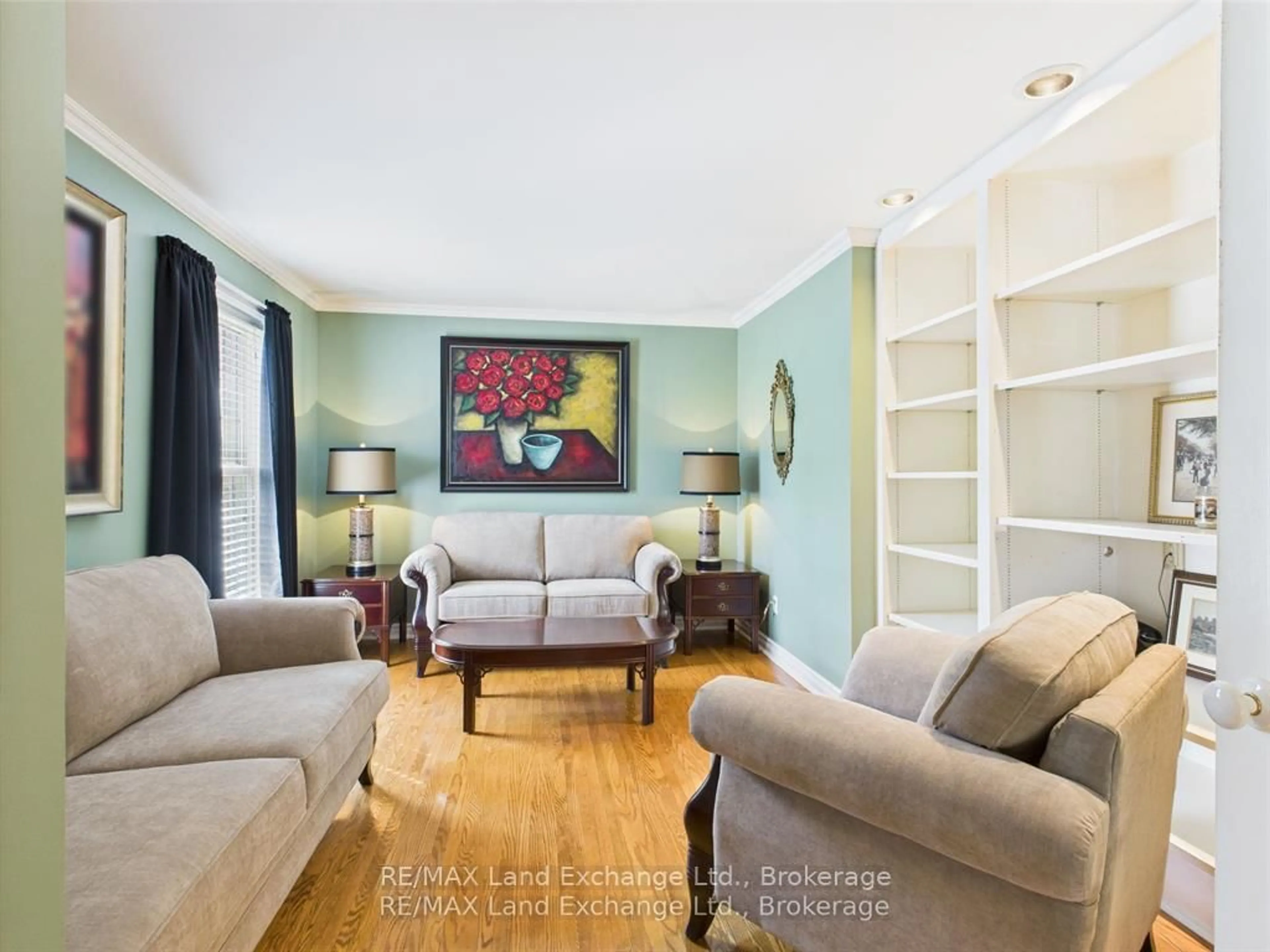 Living room with furniture, wood/laminate floor for 4 Eastwood Cres, Kincardine Ontario N0G 2T0