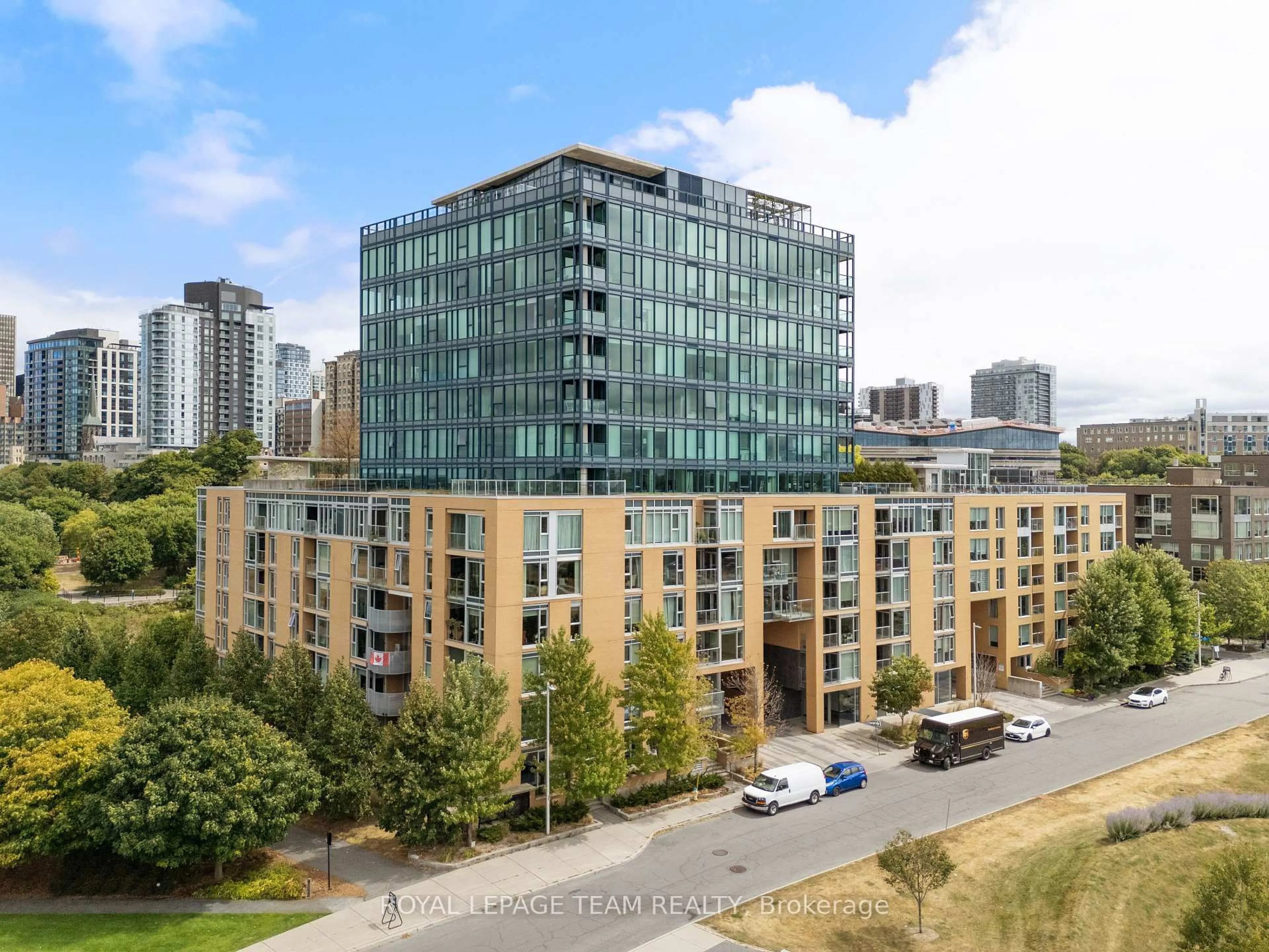 A pic from outside/outdoor area/front of a property/back of a property/a pic from drone, city buildings view from balcony for 200 Lett St #303, Ottawa Ontario K1R 0A7