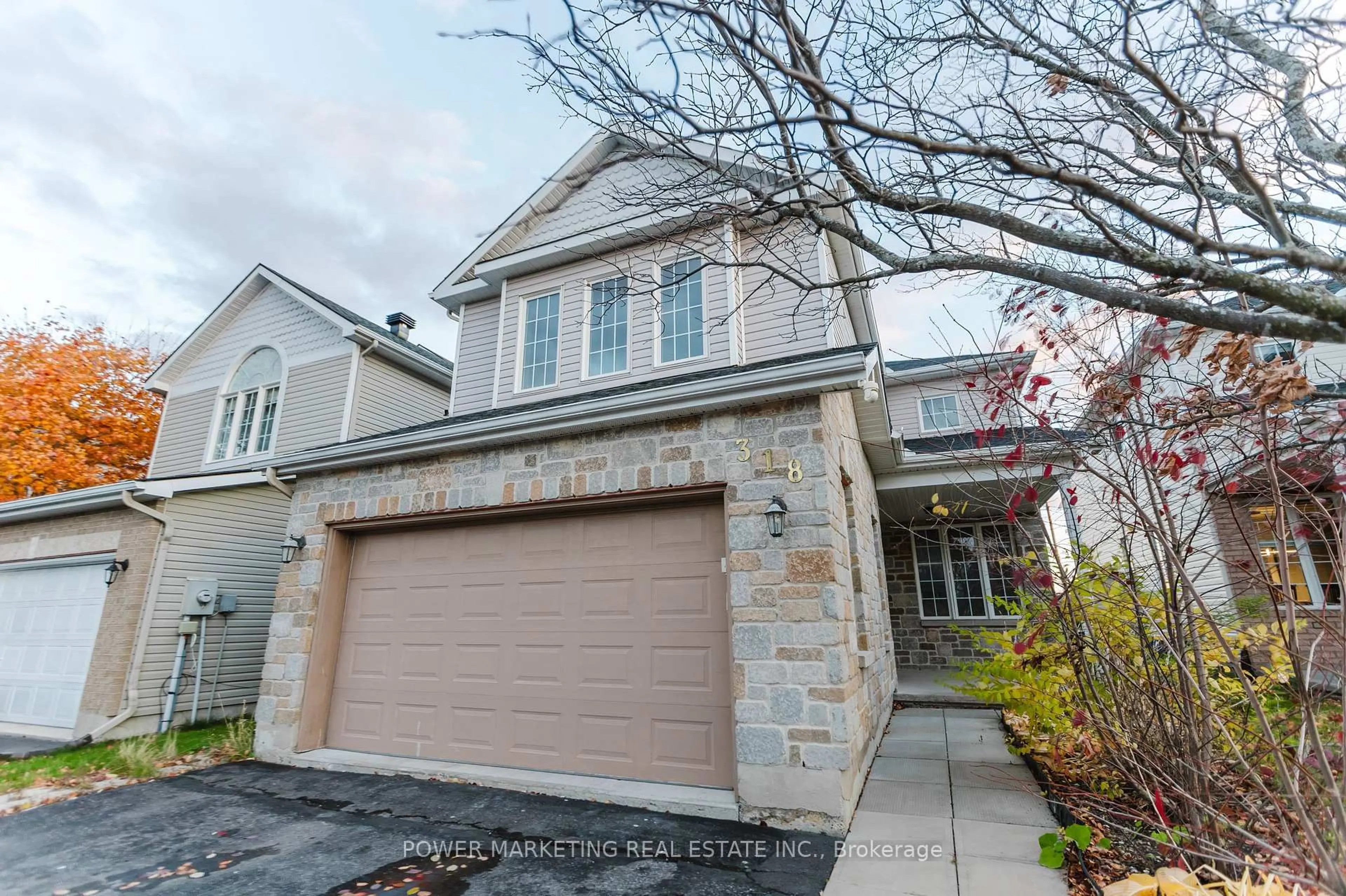 Home with brick exterior material, street for 318 Rustic Hills Cres, Ottawa Ontario K4A 5A8
