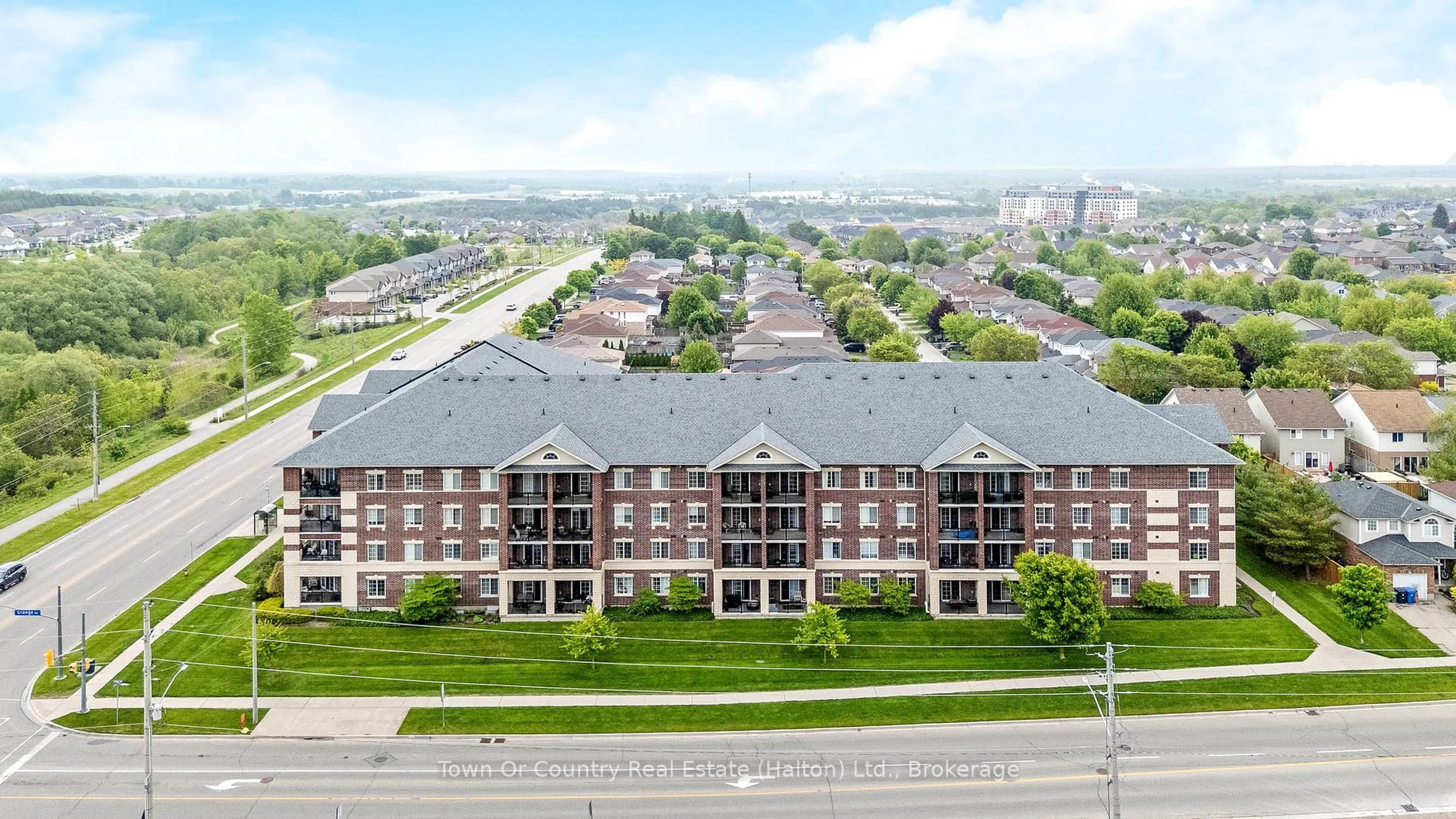 A pic from outside/outdoor area/front of a property/back of a property/a pic from drone, building for 308 Watson Pkwy #311, Guelph Ontario N1E 0G7