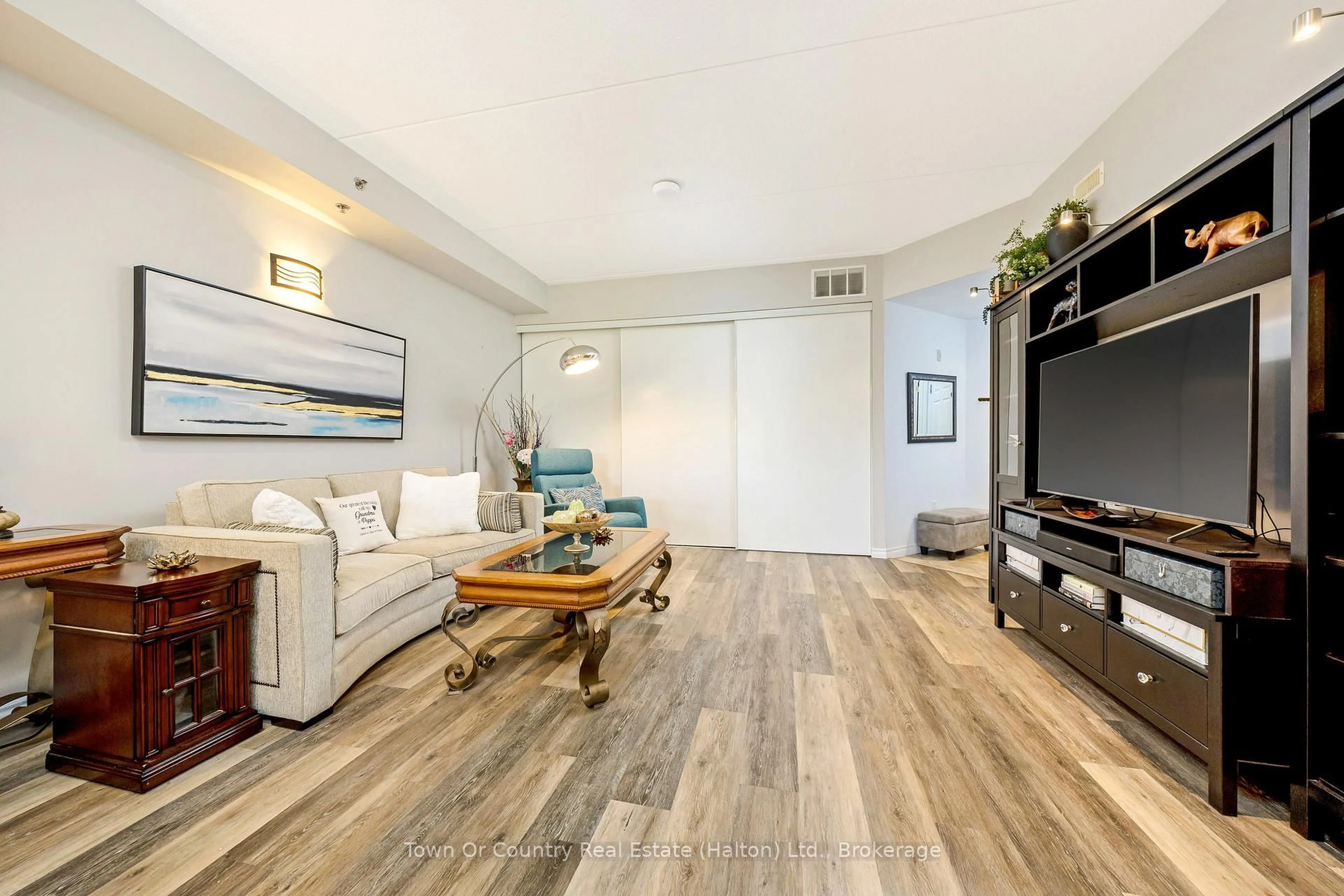 Living room with furniture, unknown for 308 Watson Pkwy #311, Guelph Ontario N1E 0G7