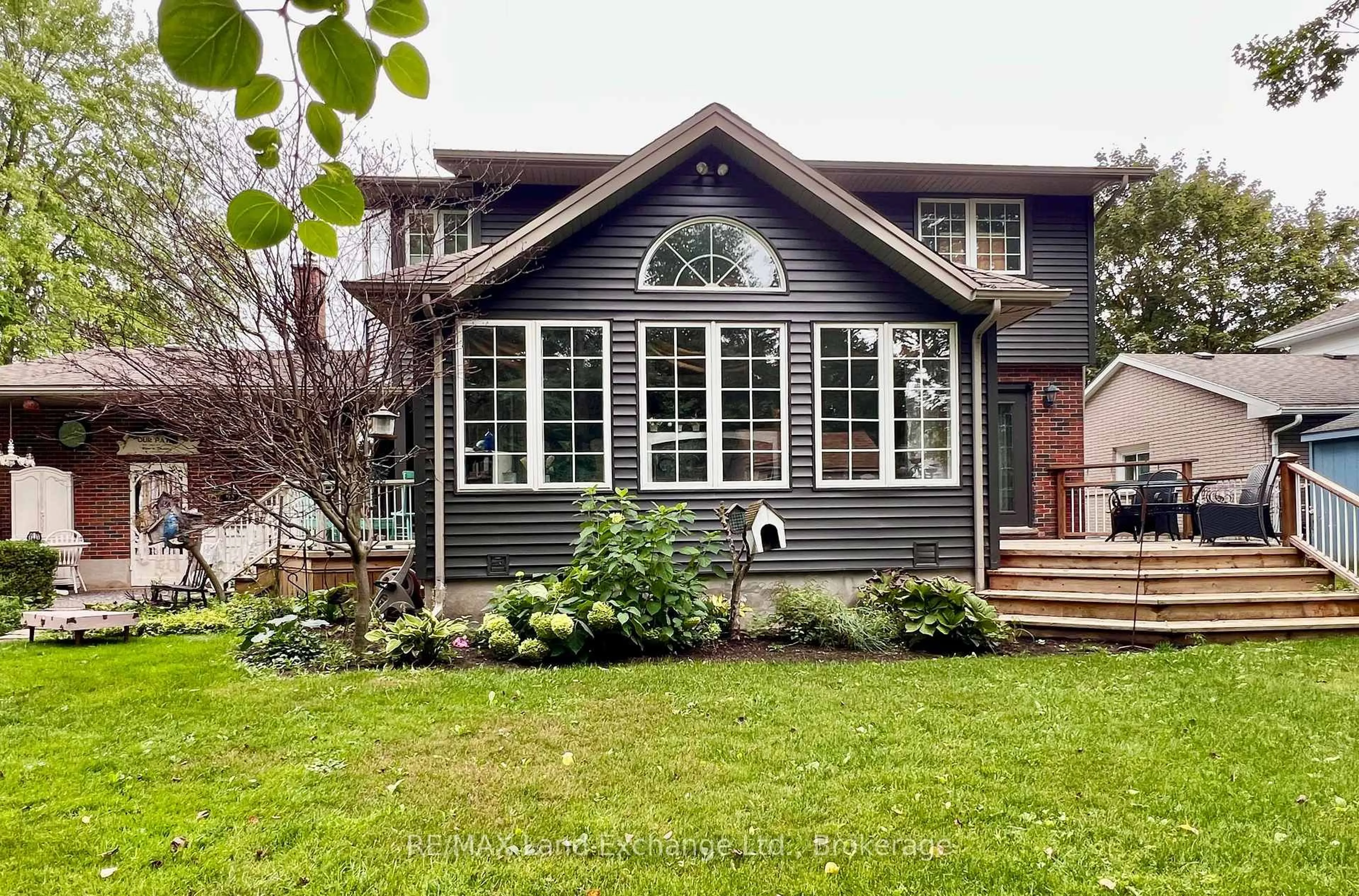 Home with vinyl exterior material, street for 14 McDonald St, North Perth Ontario N4W 1K4