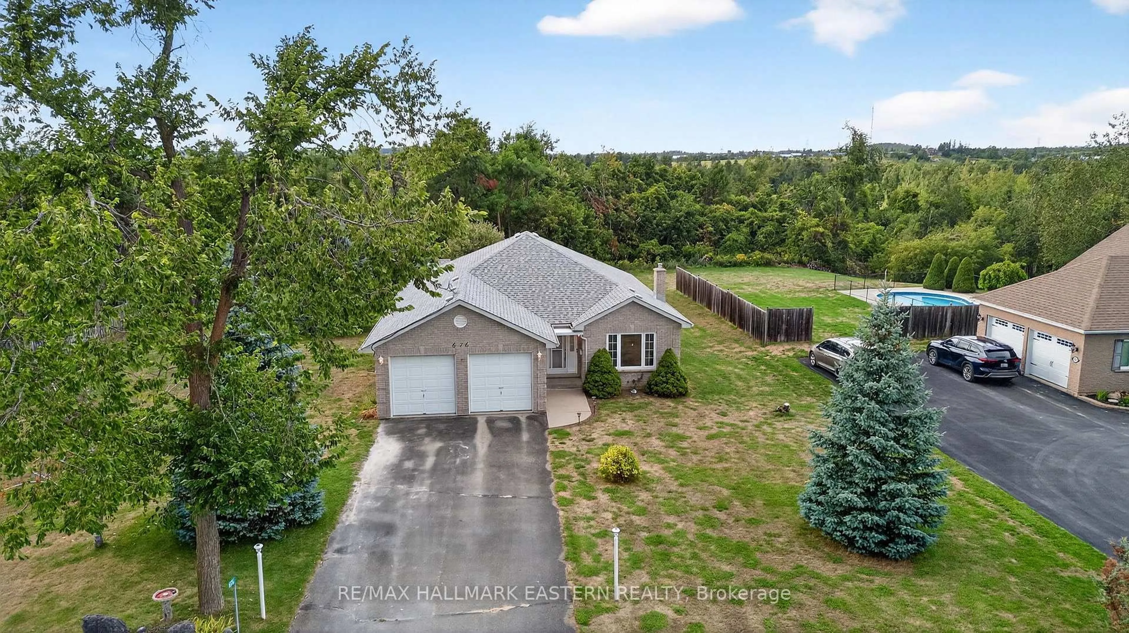 A pic from outside/outdoor area/front of a property/back of a property/a pic from drone, water/lake/river/ocean view for 676 Towerhill Rd, Peterborough Ontario K9K 2N2