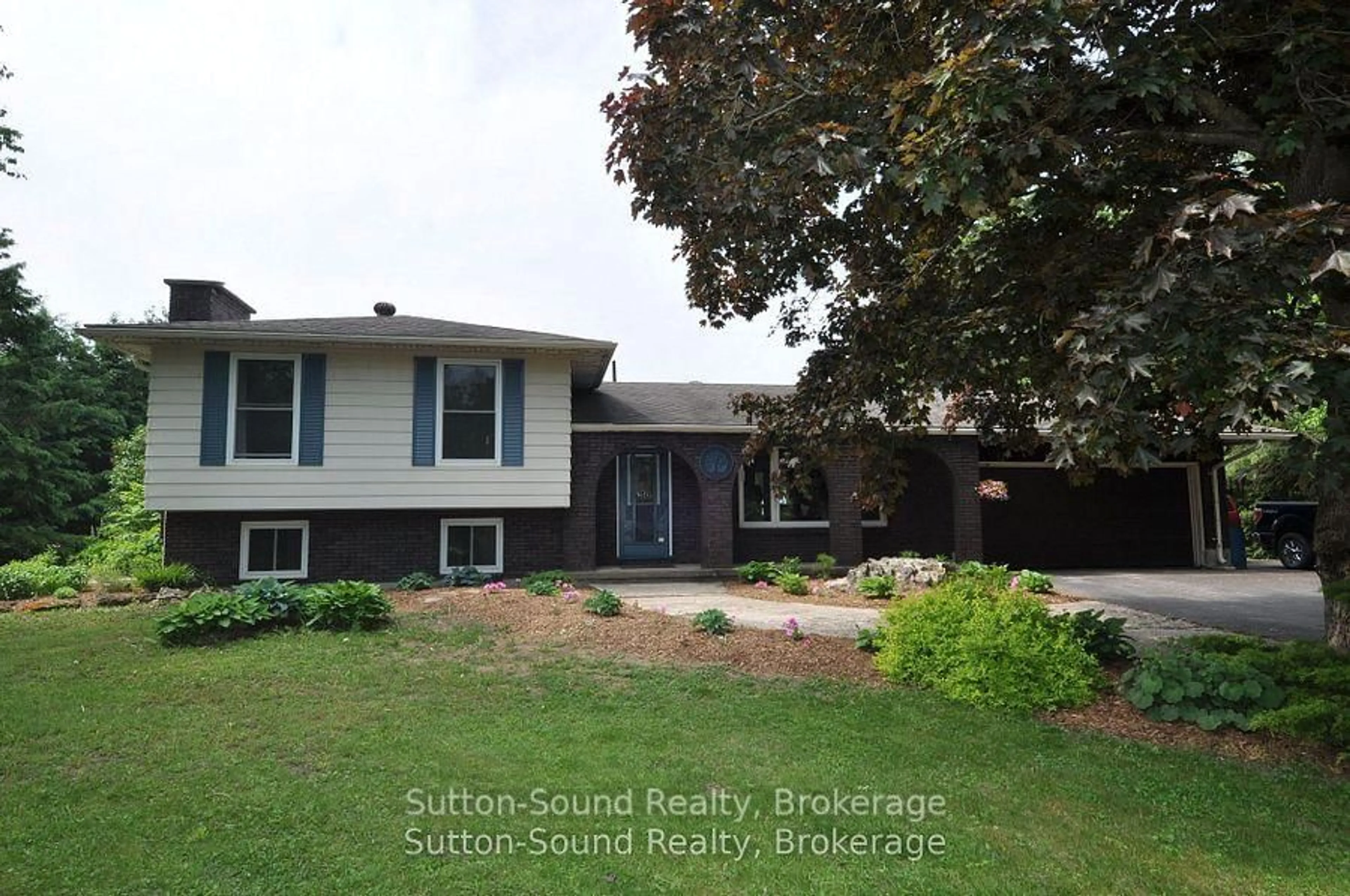 Home with vinyl exterior material, street for 719140 Highway 6 Highway, Georgian Bluffs Ontario N0H 2K0