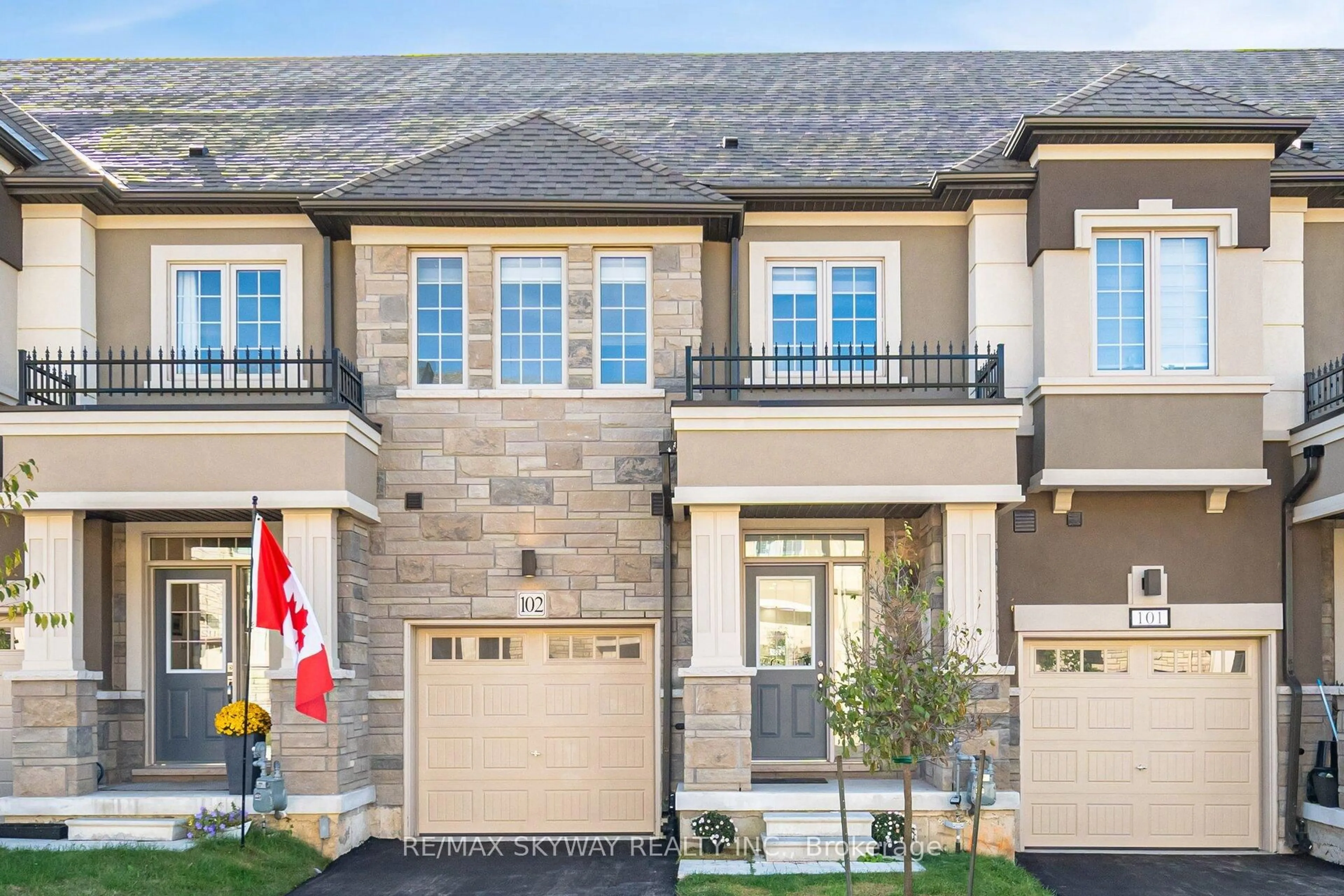 Home with brick exterior material, street for 305 Garner Rd #102, Hamilton Ontario L9G 5E6