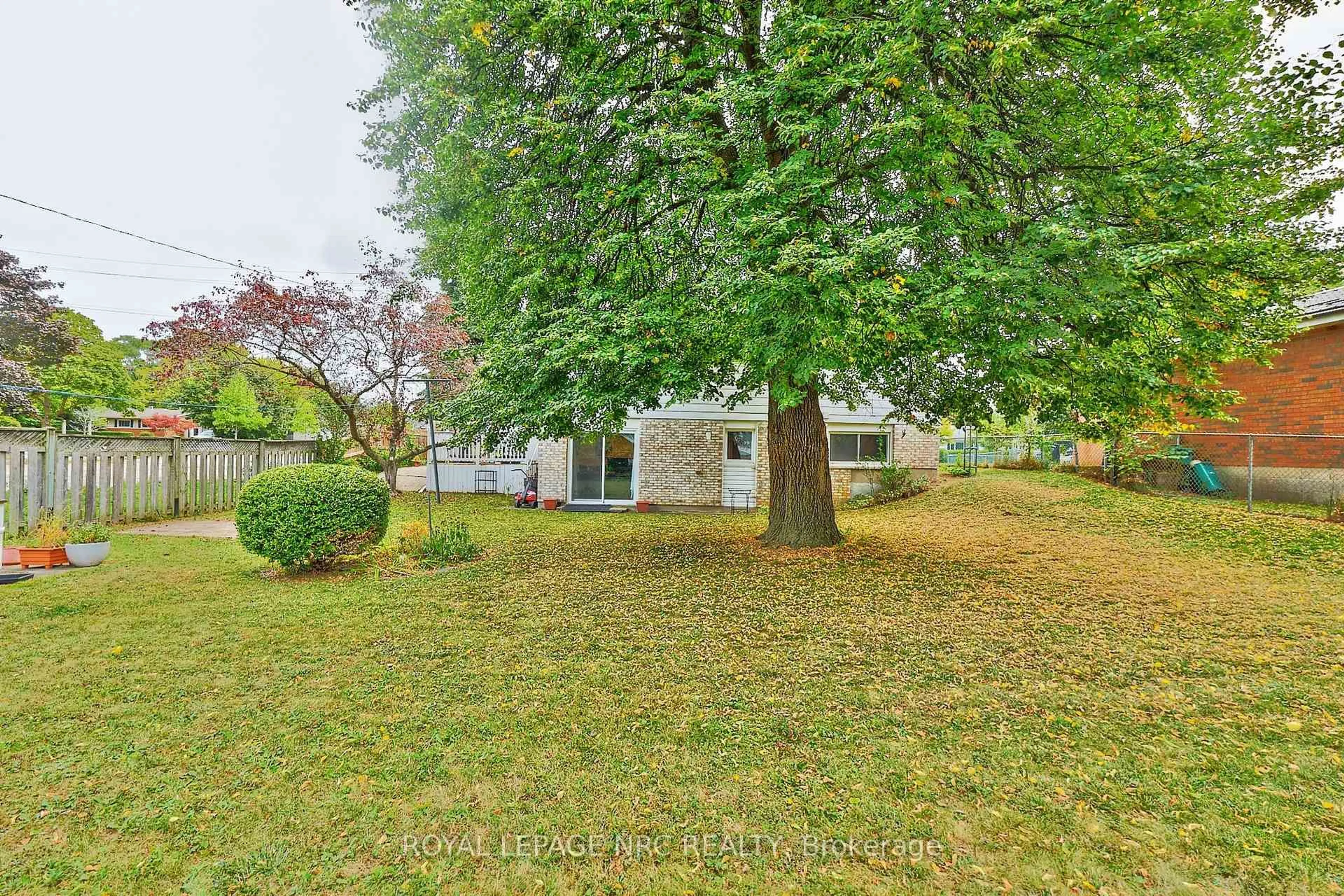 A pic from outside/outdoor area/front of a property/back of a property/a pic from drone, forest/trees view for 551 Geneva St, St. Catharines Ontario L2N 2J1