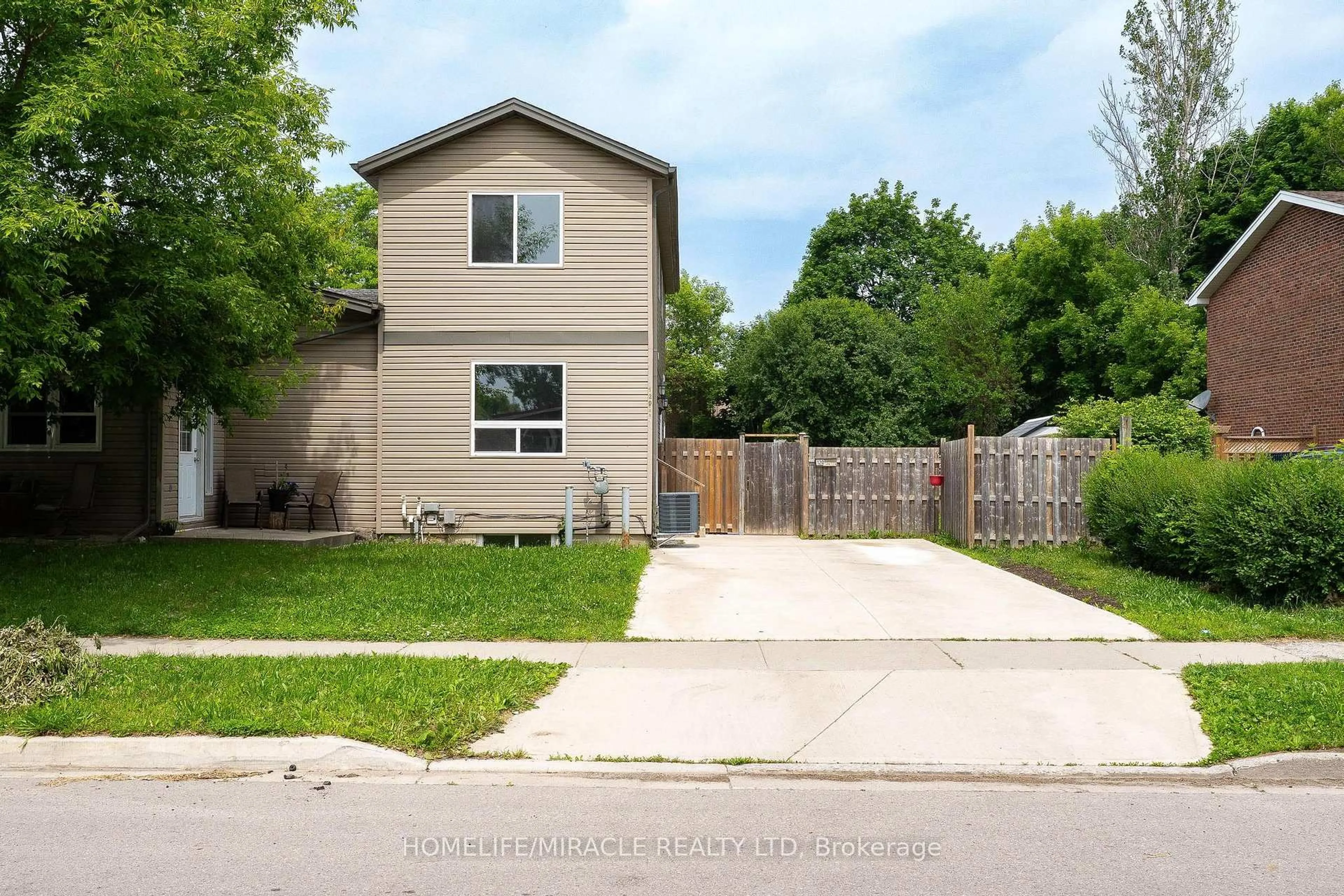 Home with vinyl exterior material, street for 120 Jansen Ave, Kitchener Ontario N2A 2L7