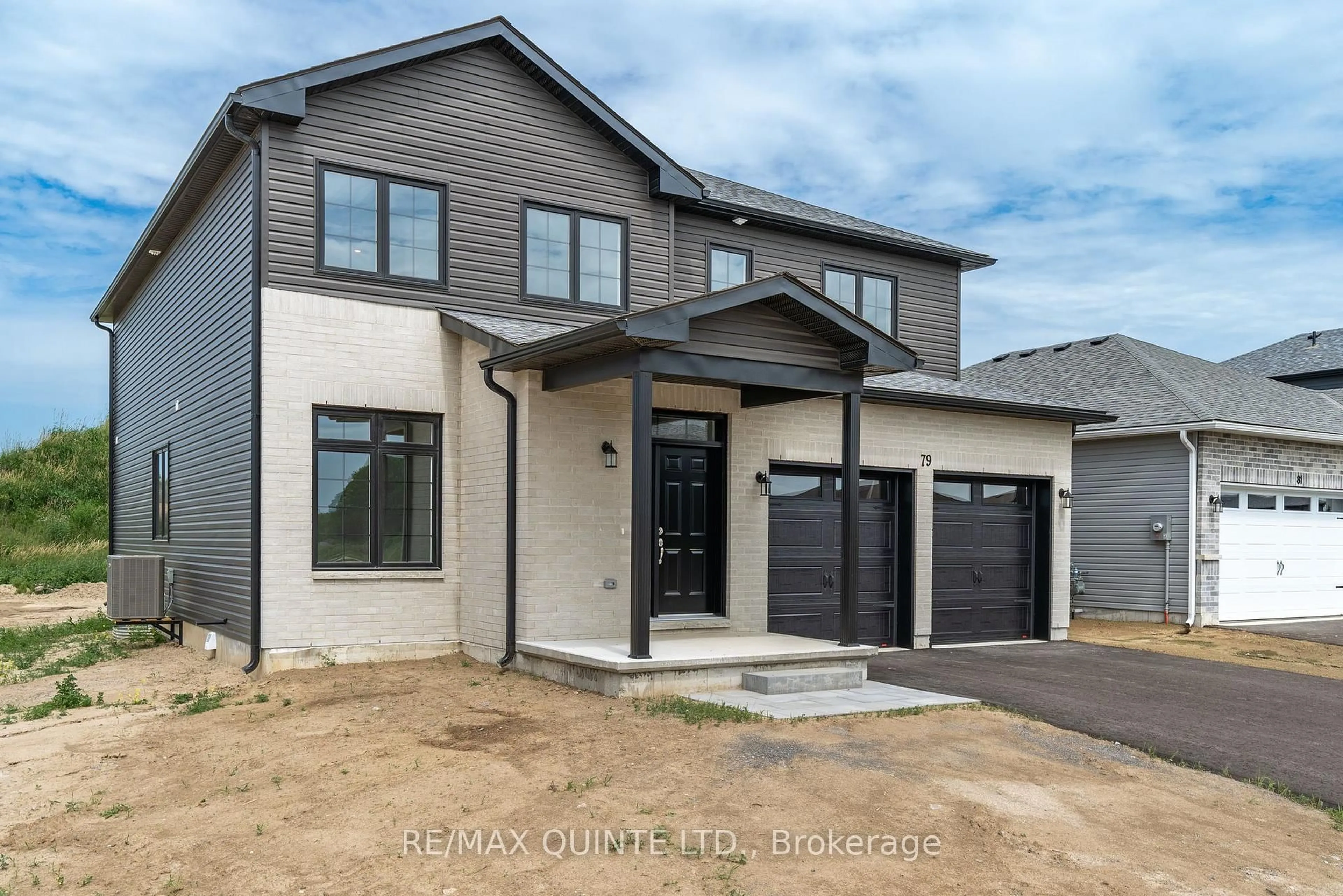 Home with brick exterior material, street for 79 George Wright Blvd, Prince Edward County Ontario K0K 2T0