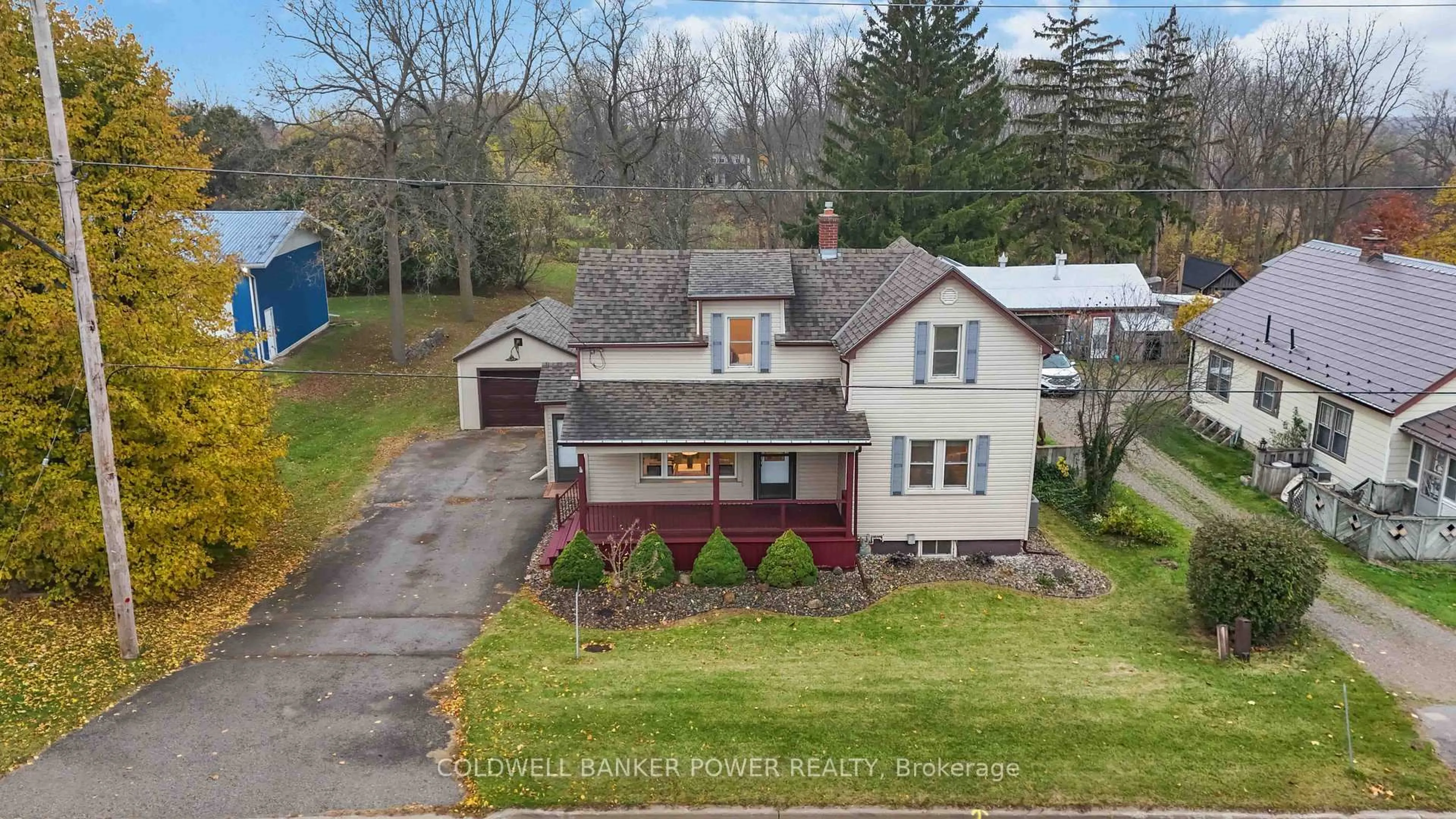 A pic from outside/outdoor area/front of a property/back of a property/a pic from drone, street for 10701 Sunset Dr, Southwold Ontario N5P 3T2