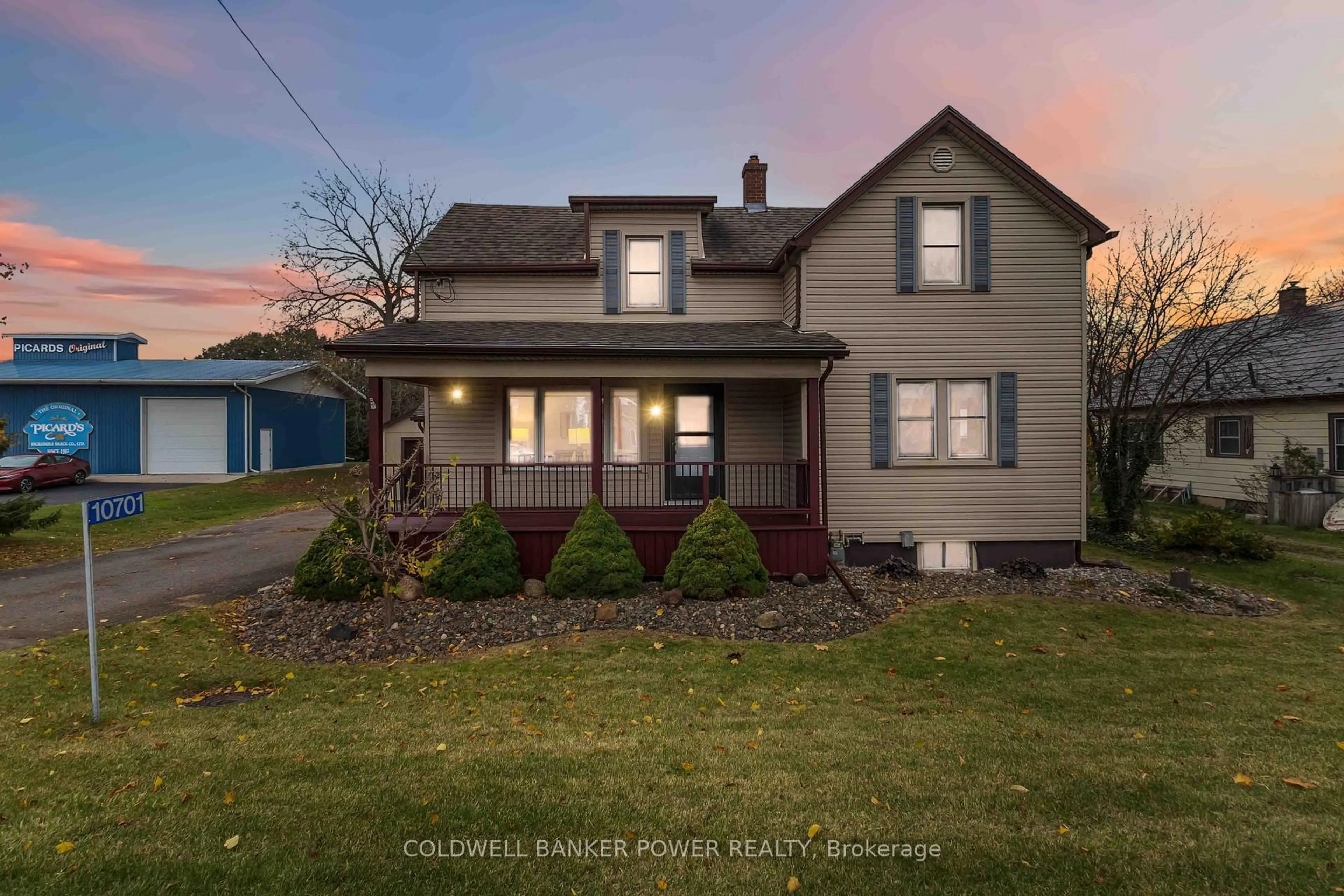 A pic from outside/outdoor area/front of a property/back of a property/a pic from drone, street for 10701 Sunset Dr, Southwold Ontario N5P 3T2