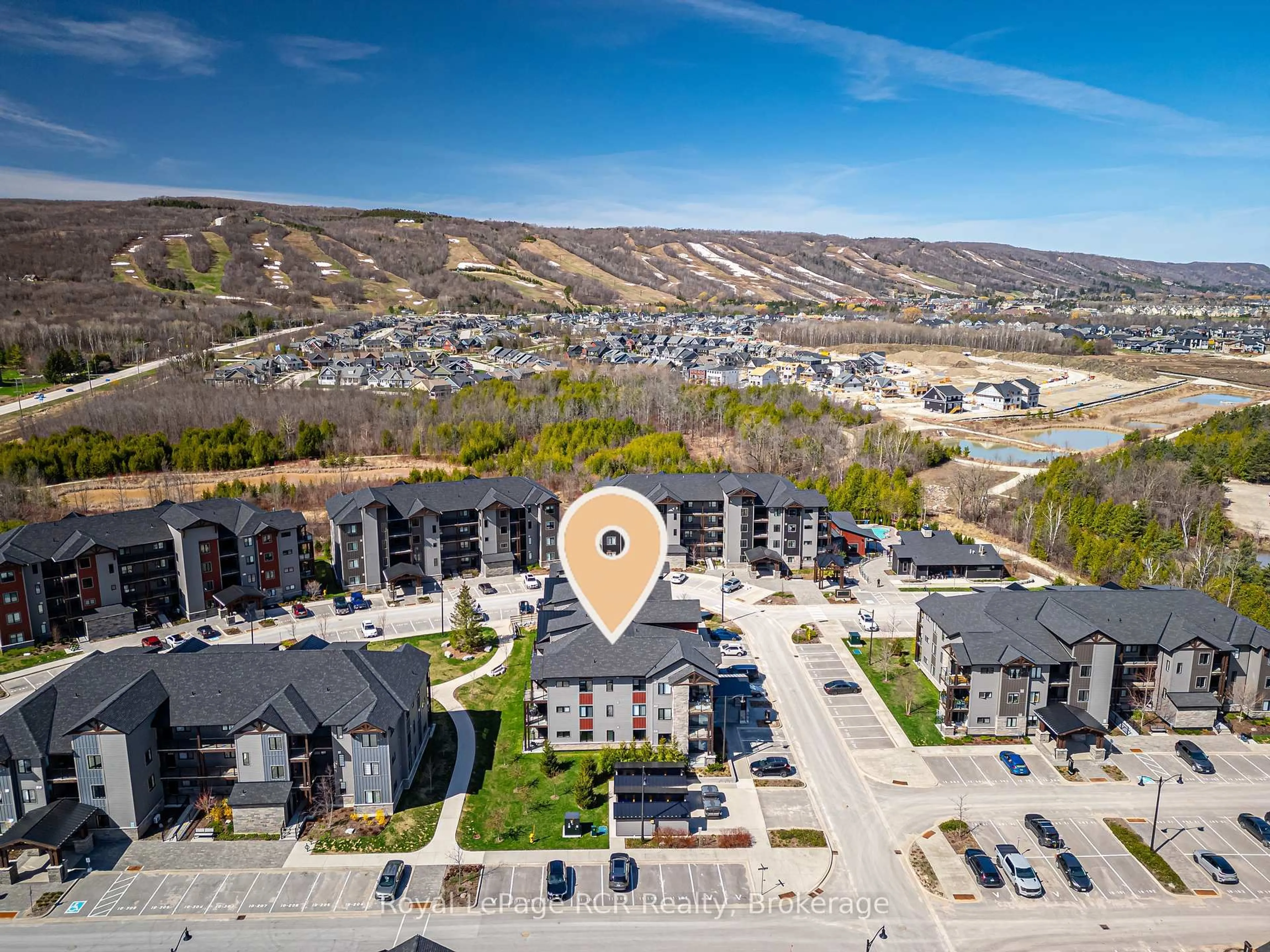 A pic from outside/outdoor area/front of a property/back of a property/a pic from drone, mountain view for 11 Beckwith Lane #102, Blue Mountains Ontario L9Y 0C7