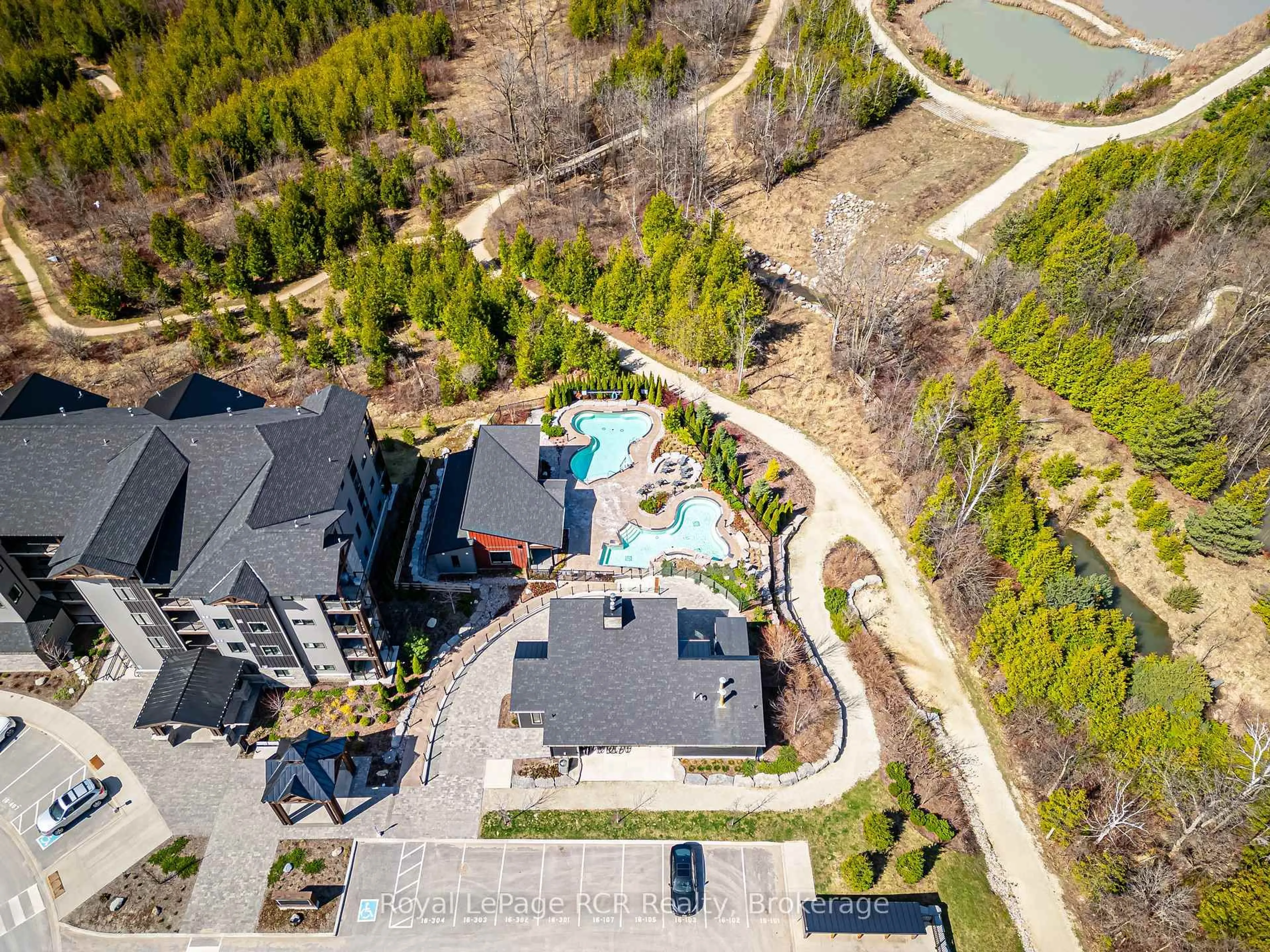 A pic from outside/outdoor area/front of a property/back of a property/a pic from drone, water/lake/river/ocean view for 11 Beckwith Lane #102, Blue Mountains Ontario L9Y 0C7